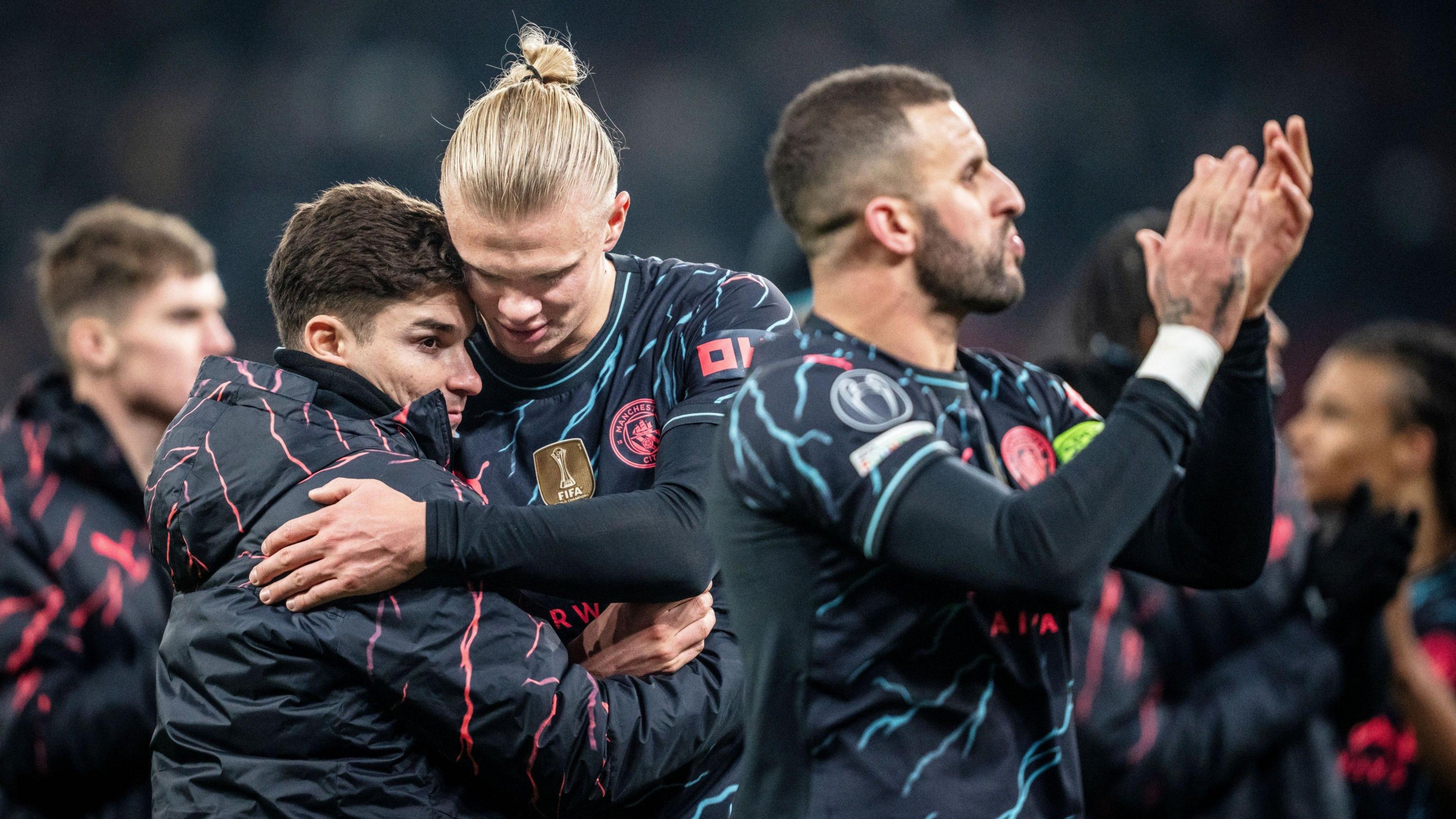 Haaland embraces Alvarez after the match