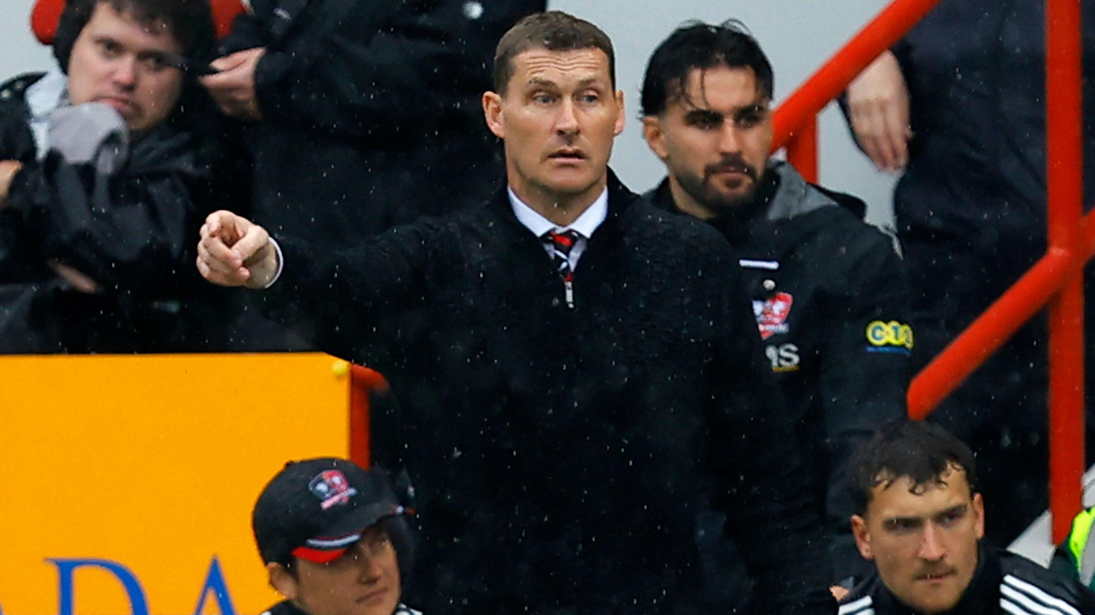 Exeter City boss Matt Taylor issues instructions to his players during their 2-1 home loss to Bradford City, which saw them relegated.