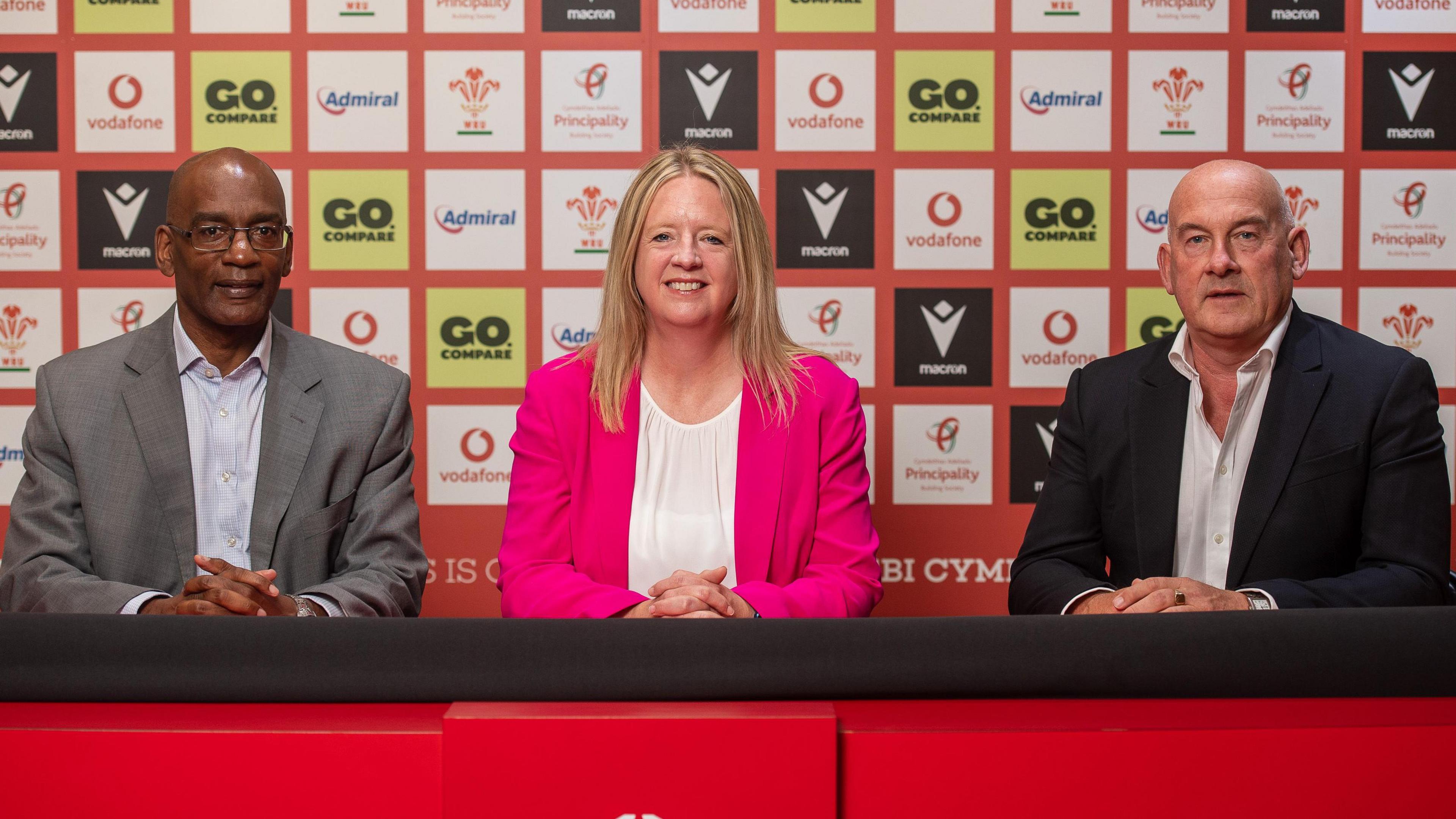 Former Welsh Rugby Union executive director Nigel Walker (left) sits alongside chief executive Abi Tierney (centre) and chair Richard Collier-Keywood (right) at a media conference