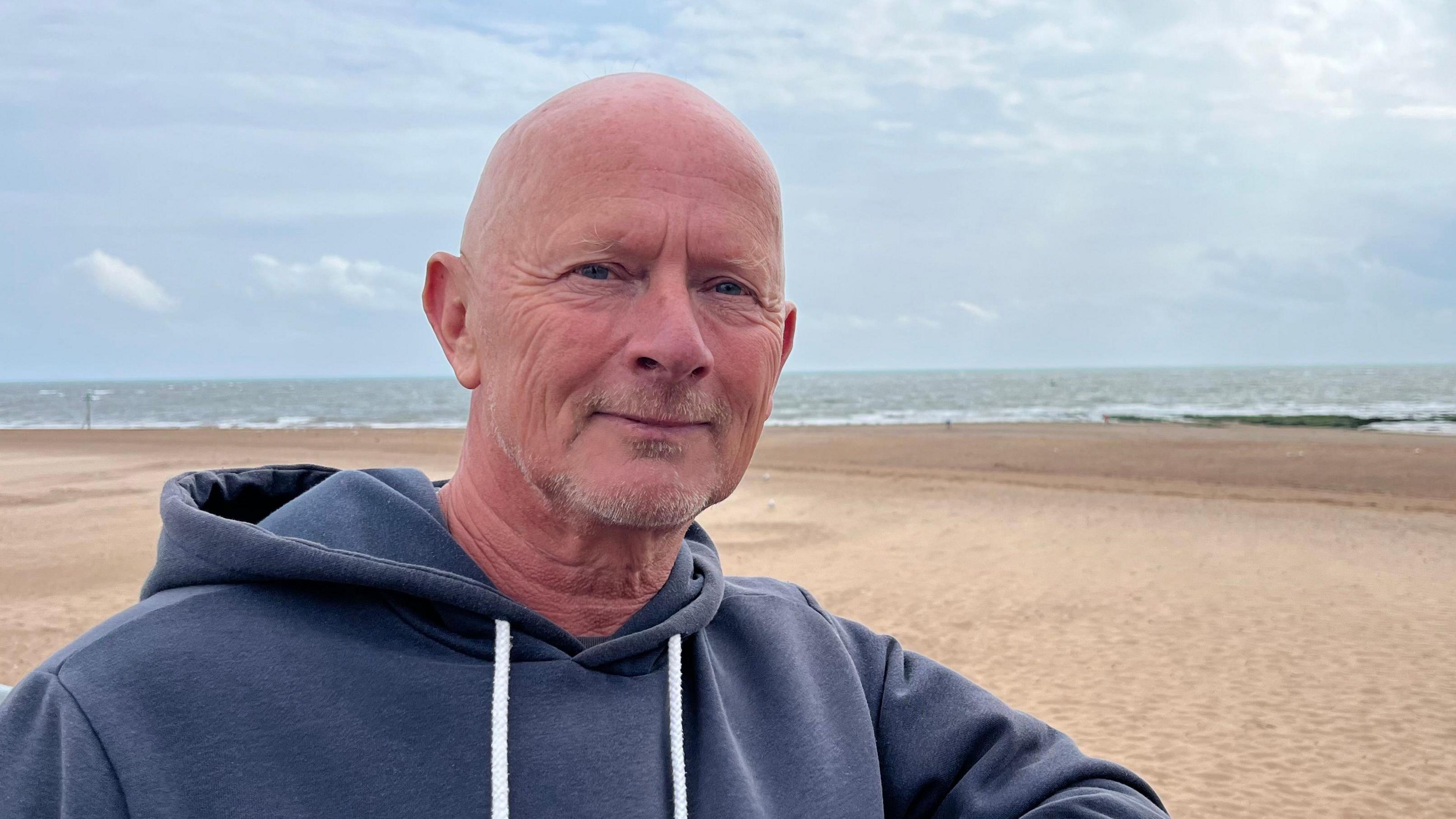 Andy Tyerman pictured on a beach 