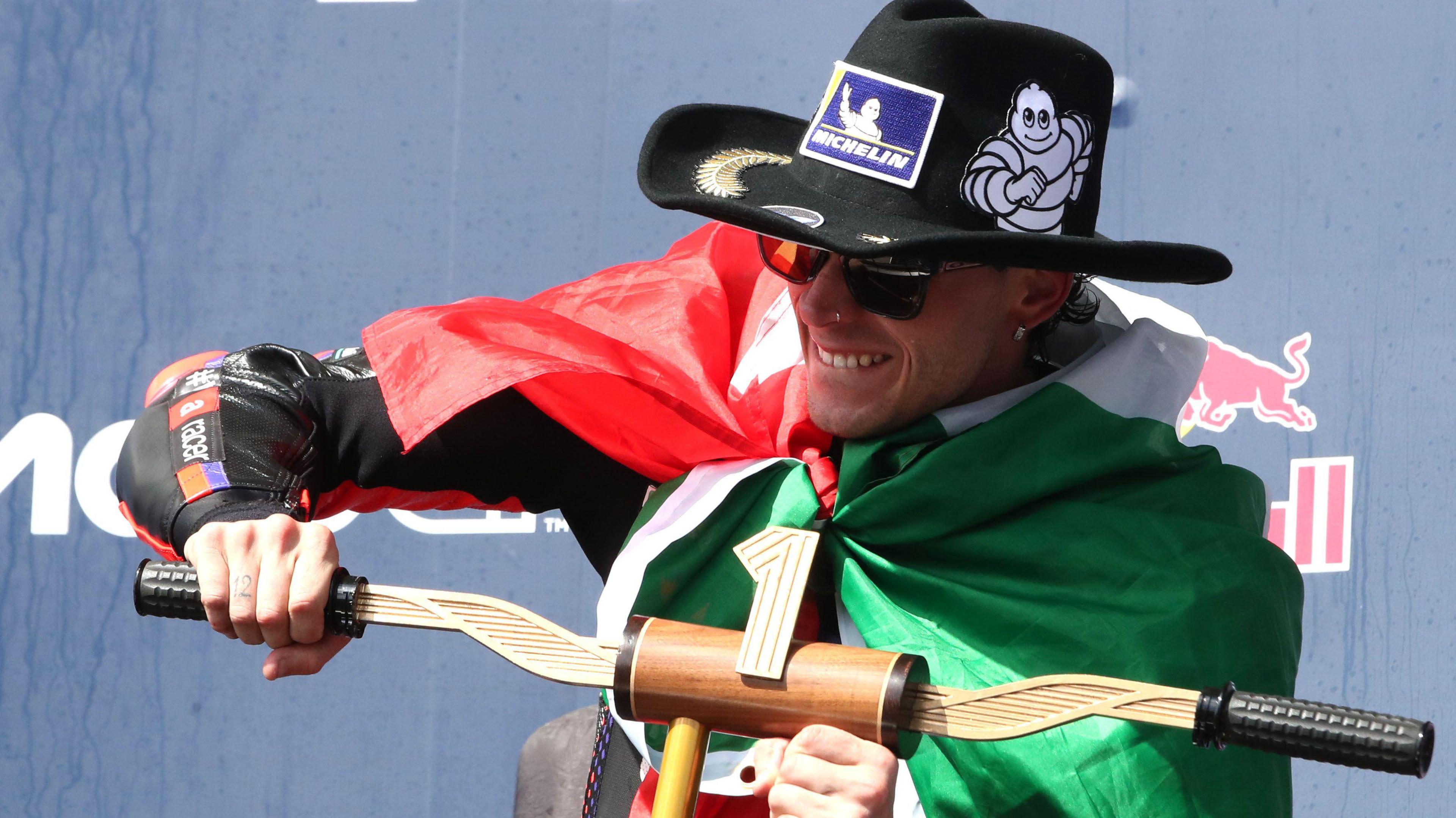 Italy's Marco Bezzecchi celebrates victory at the US Grand Prix 