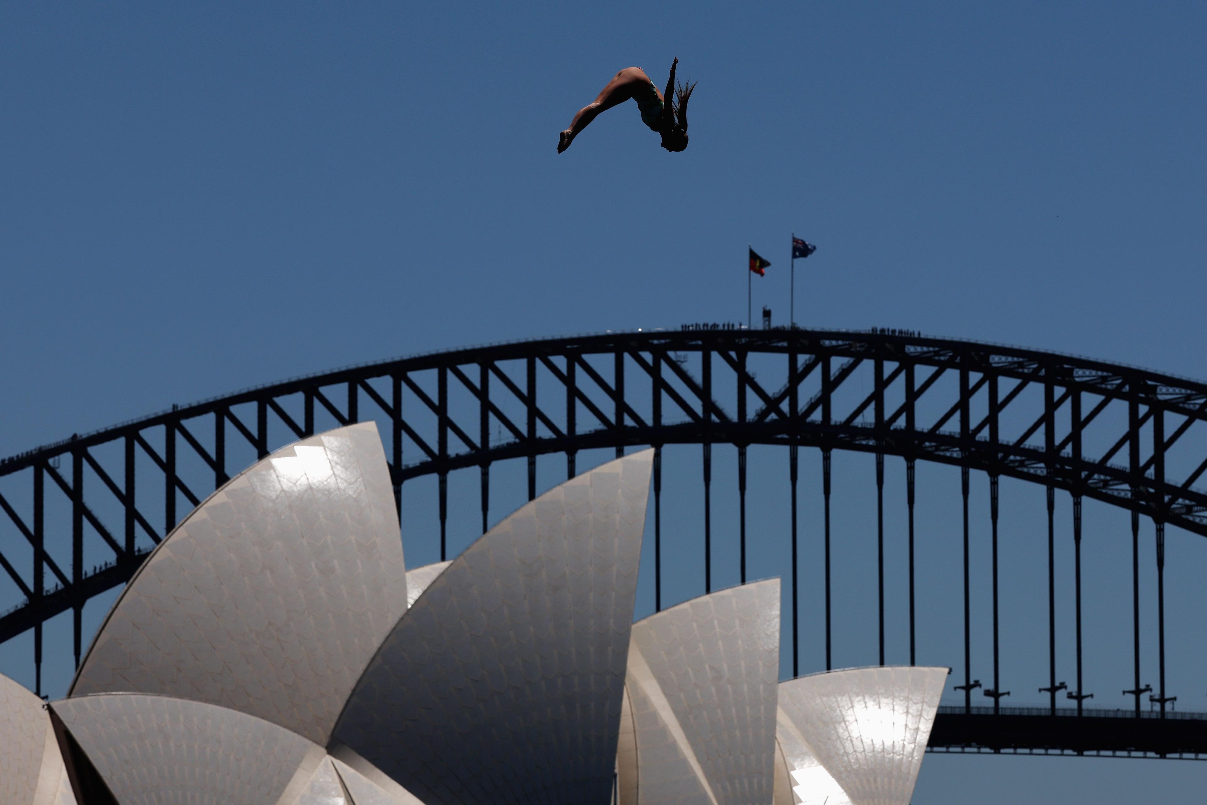 Kaylea Arnett of the United States dives during the Red Bull Cliff Diving World Final held at Mrs Macquarie's Chair on Sydney Harbour on 8 November 2024 in Sydney, Australia.