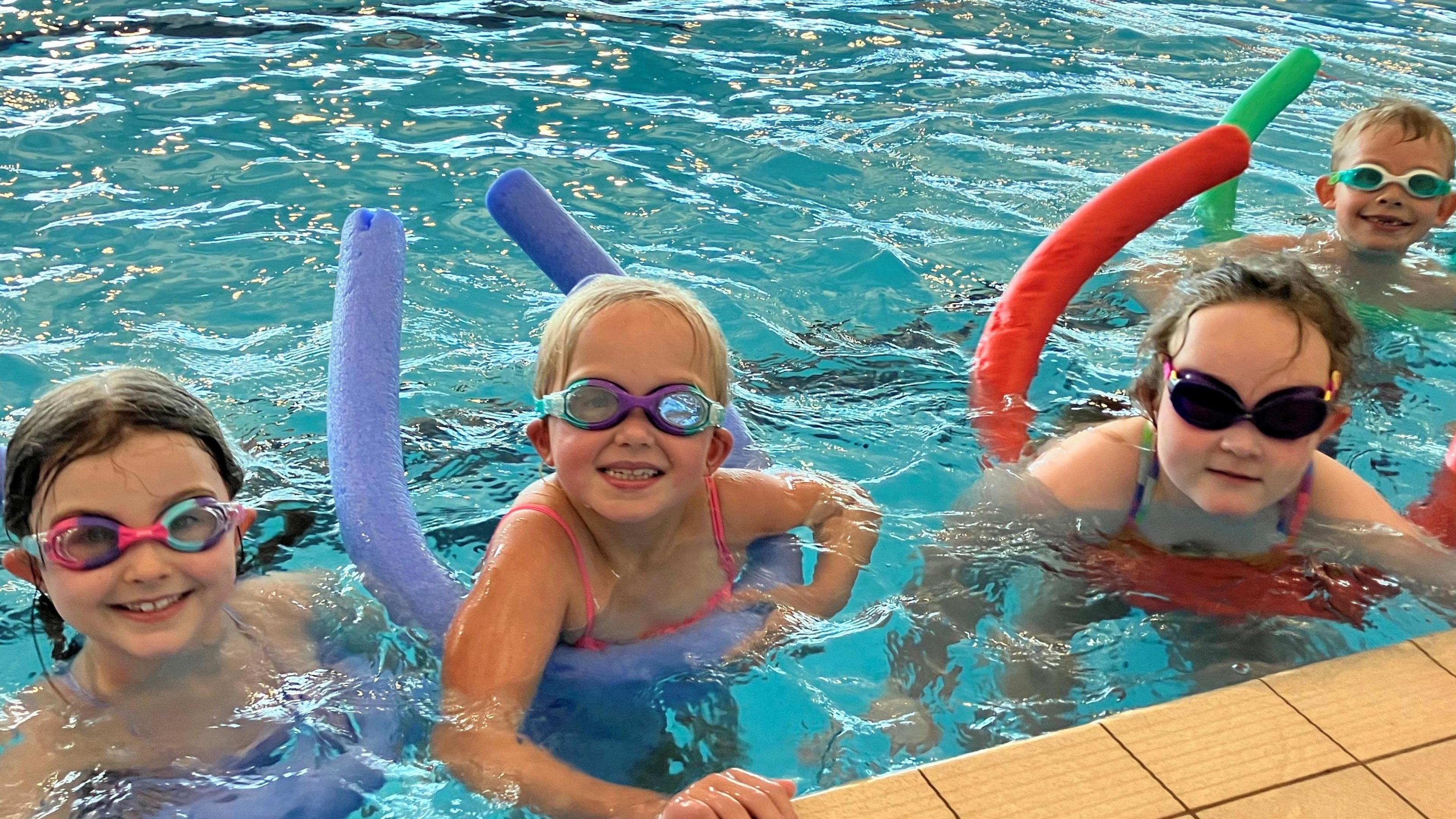 Children beside the pool