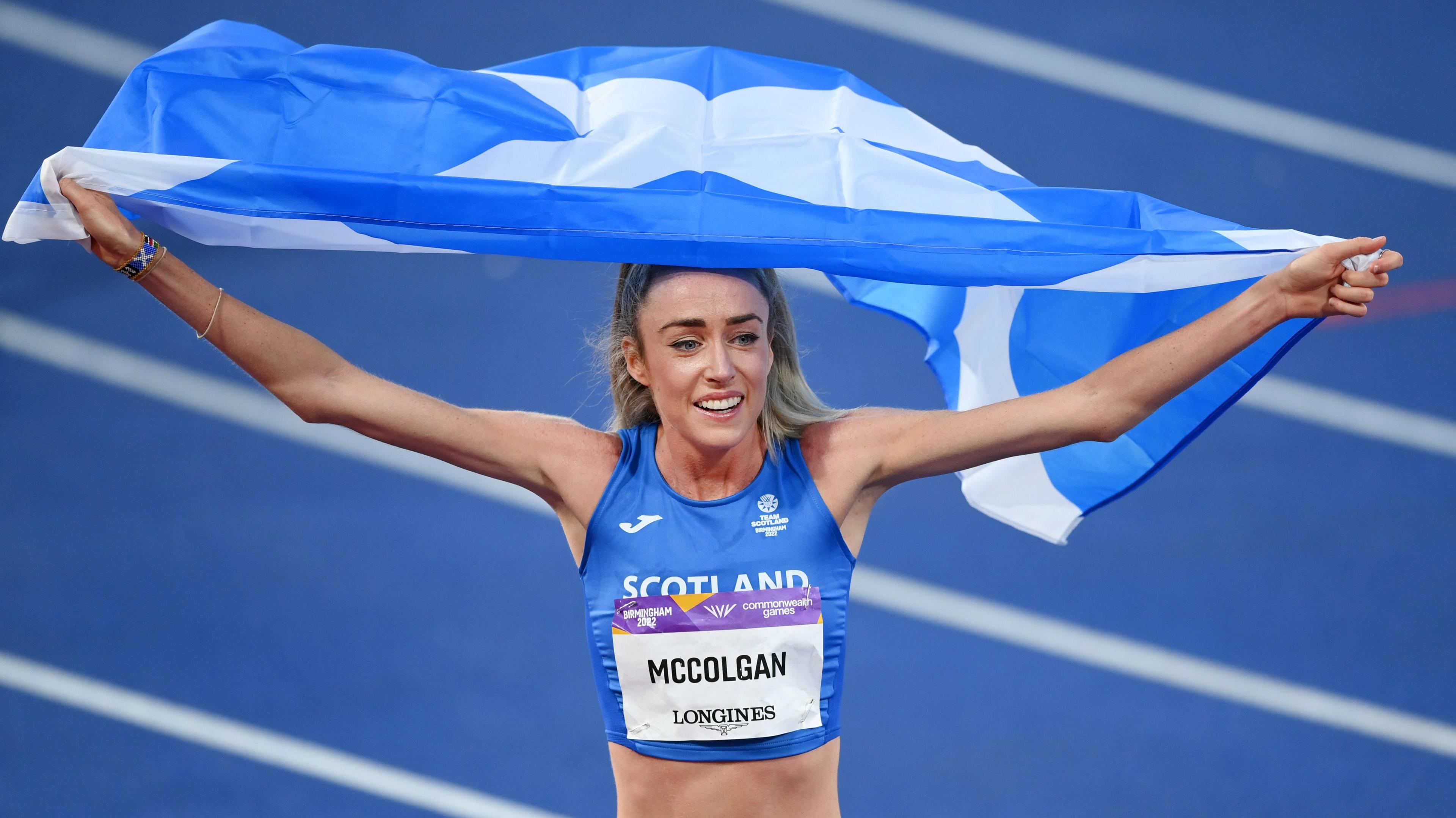 Eilish McColgan celebrates winning the Women's 10,000m