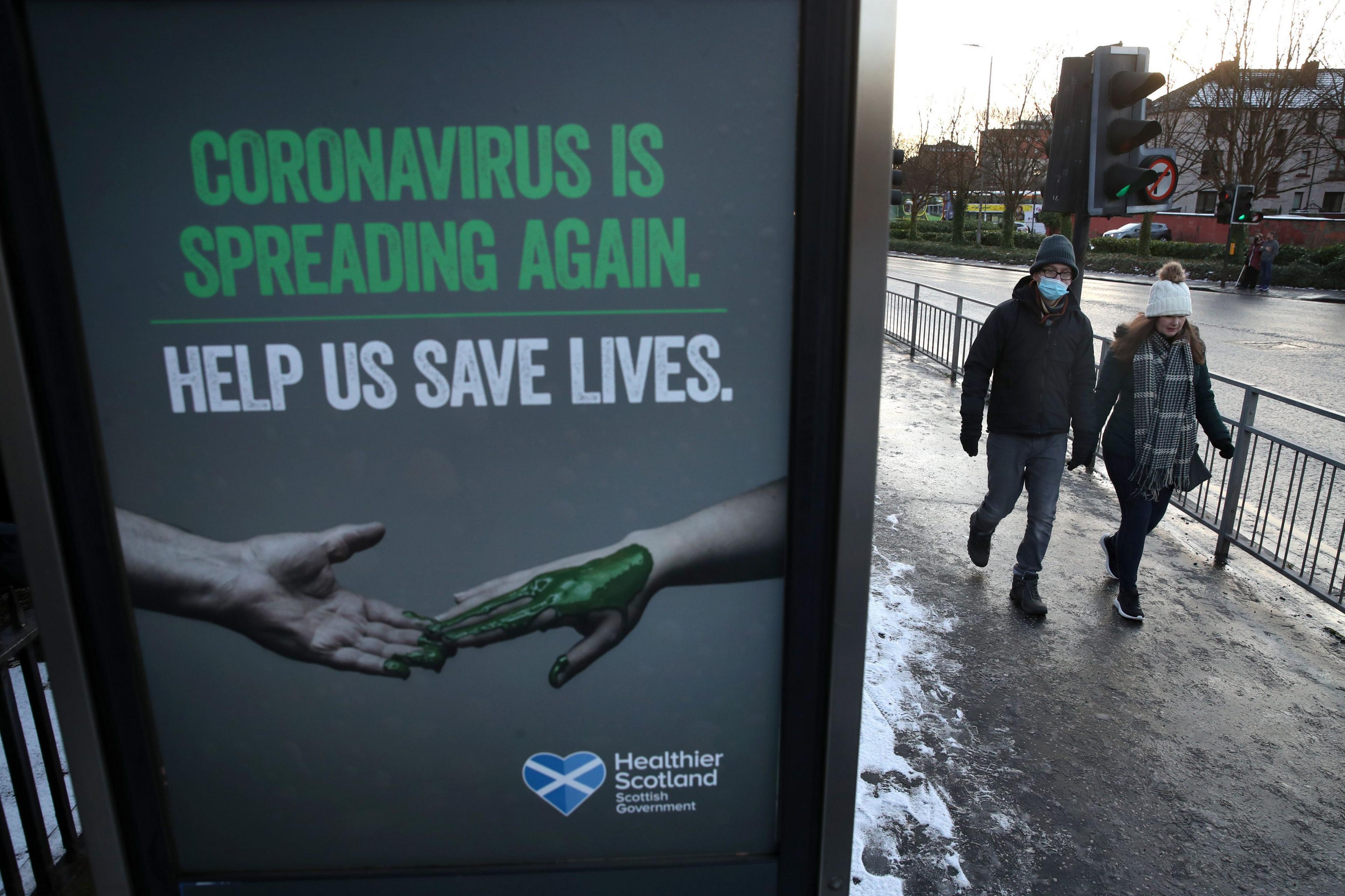 Picture of a bus stop advertisement about the Scottish government's public health campaign about the spread of Covid