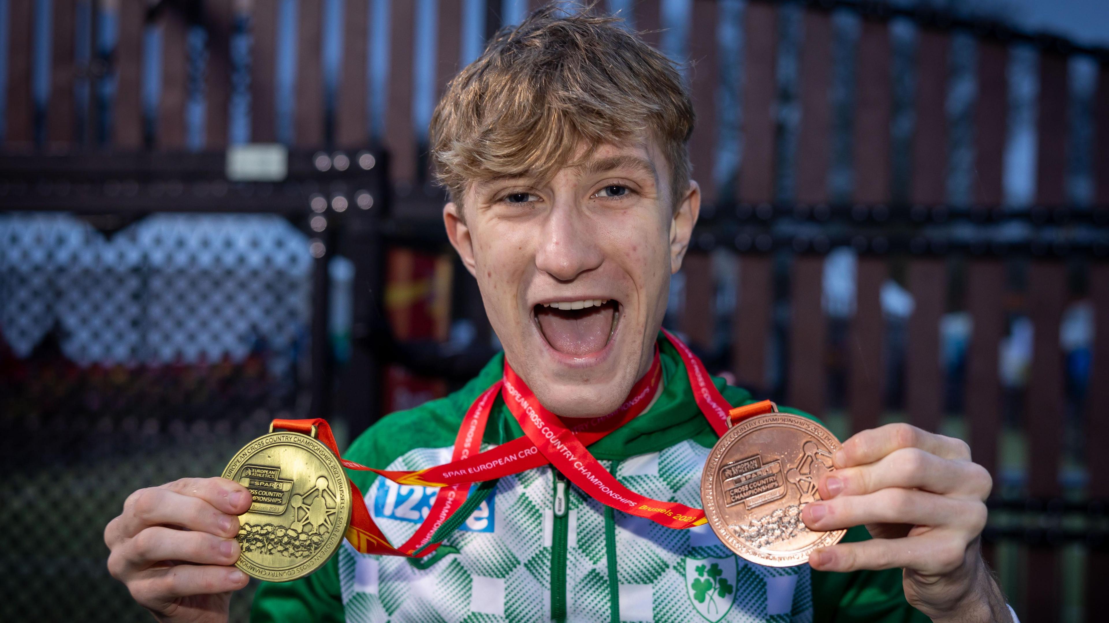 Nick Griggs with his under-20 team gold and individual bronze medals at last year's European Cross Country Championships in Brussels