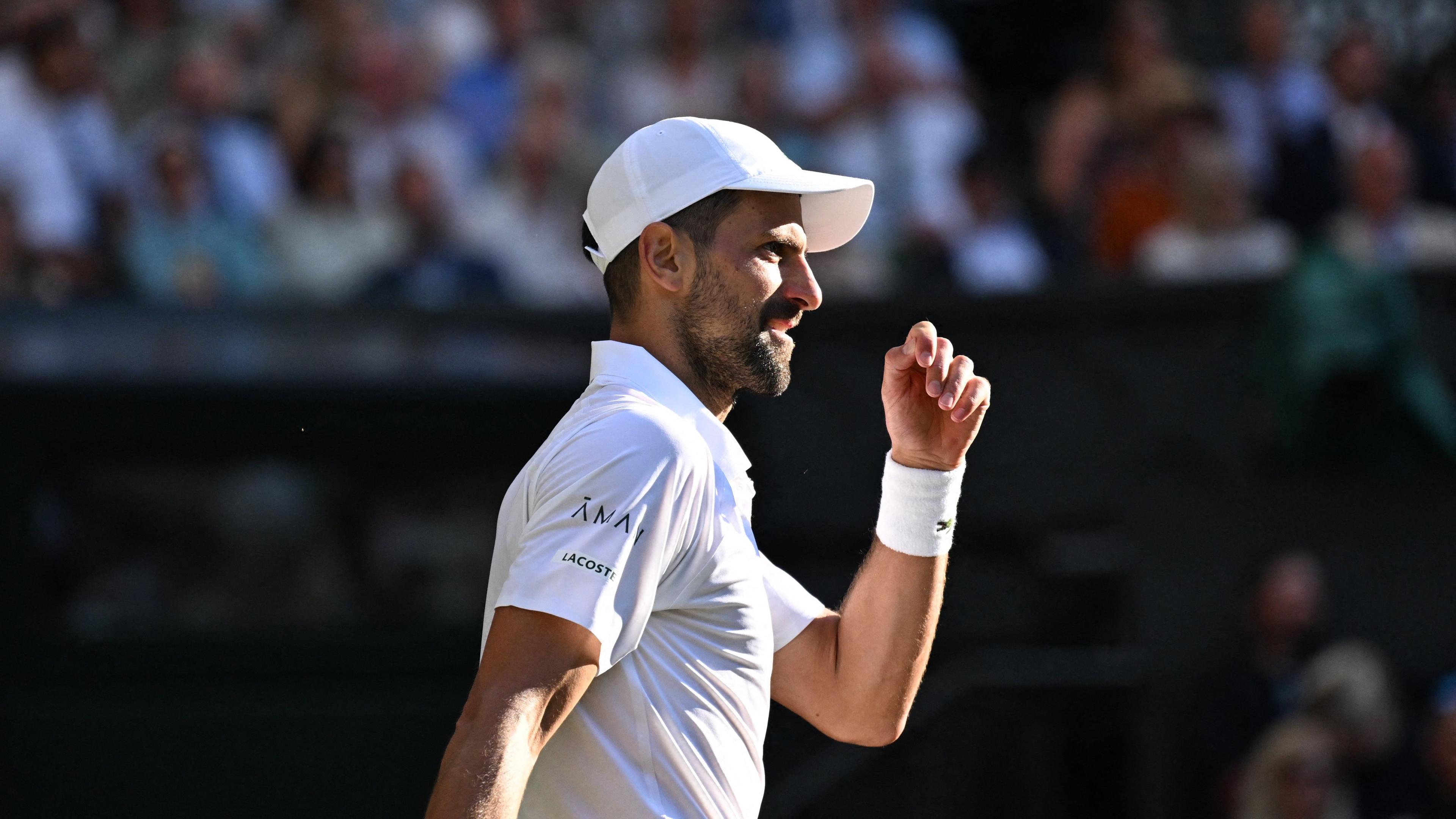 Novak Djokovic celebrates during quarter-final match against Flavio Cobolli on Wimbledon's Centre Court