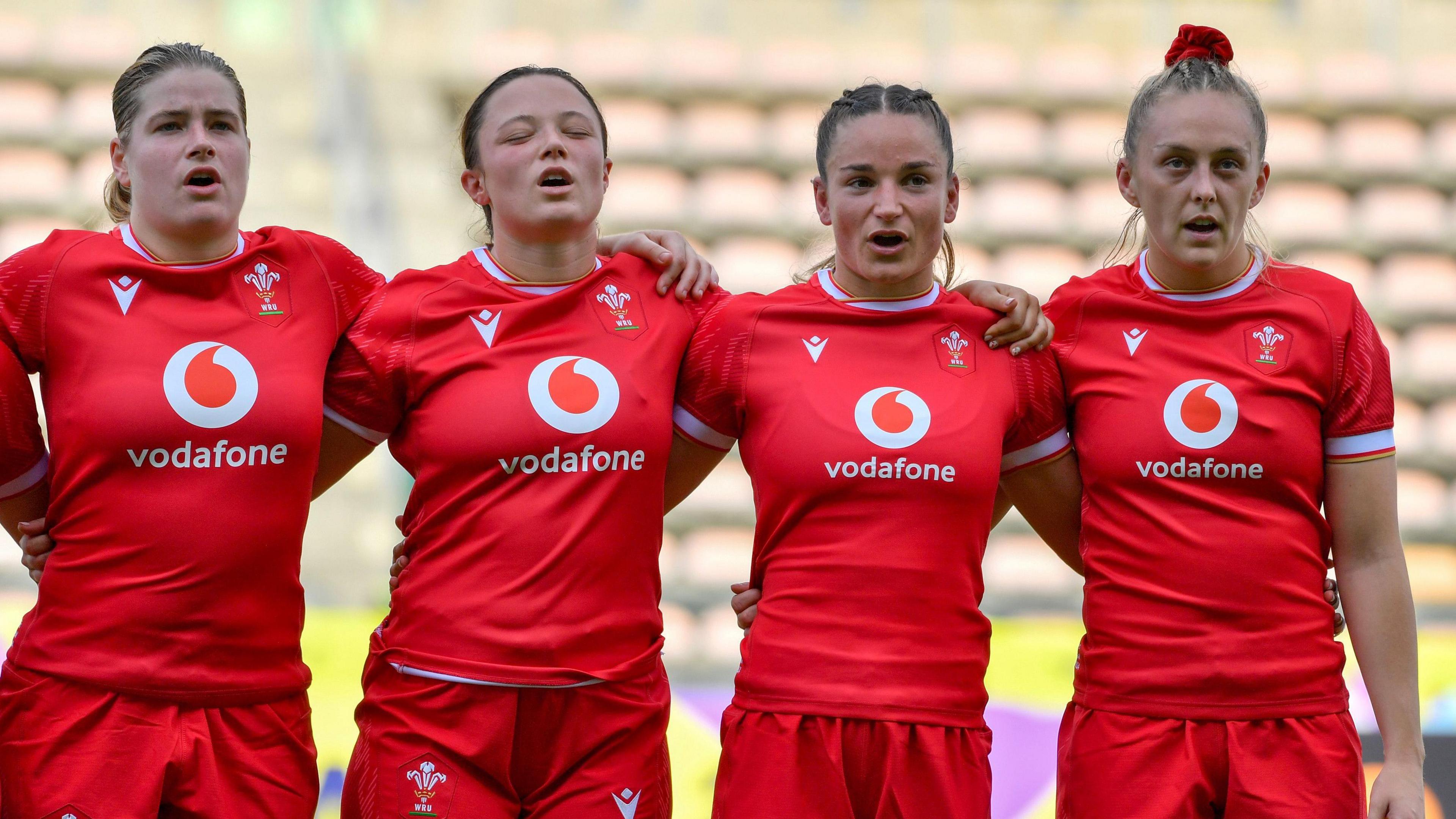 Bethan Lewis, Alisha Joyce-Butchers, Jasmine Joyce-Butchers and Hannah Jones line up to sing the anthem