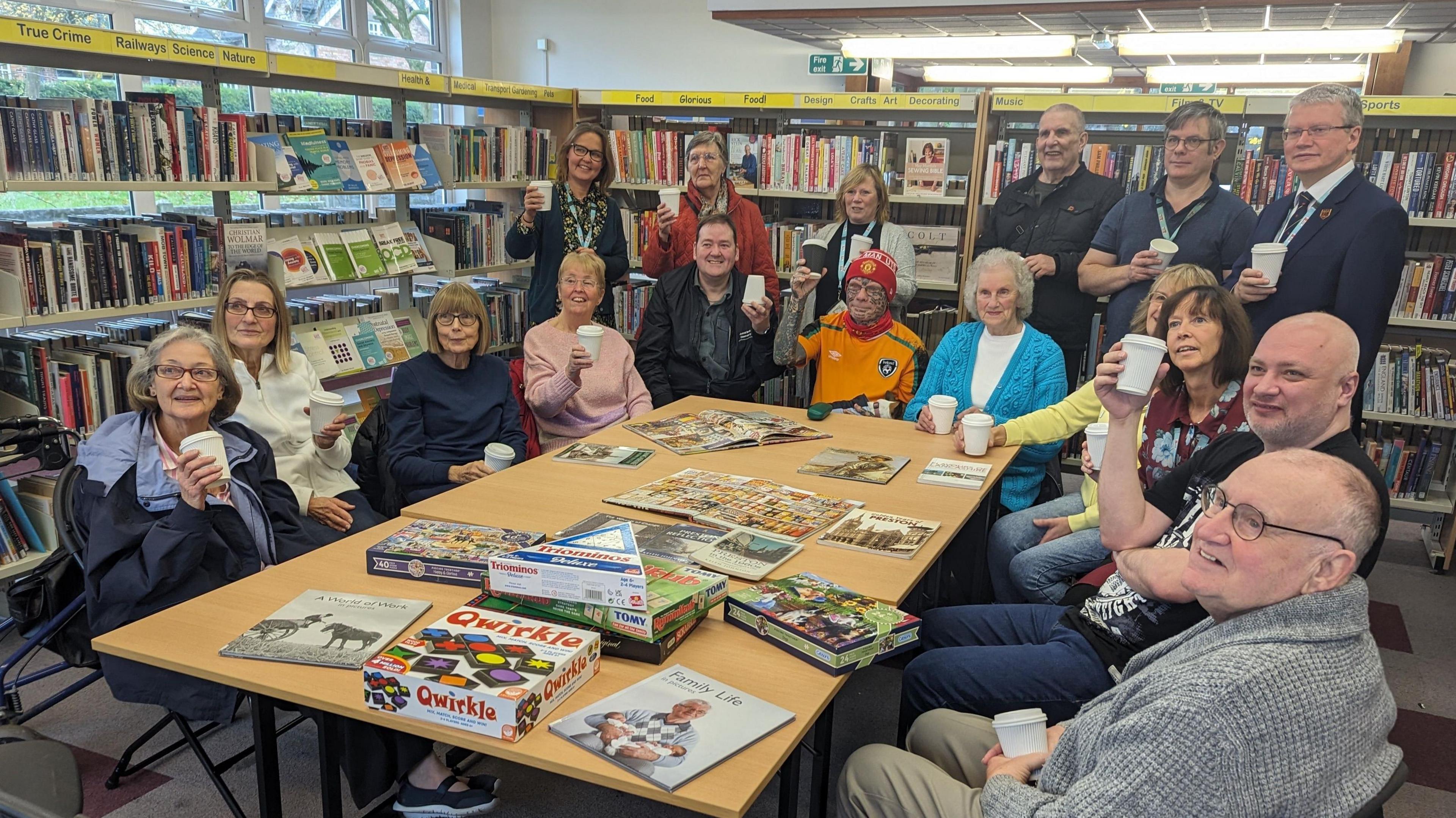 A group of people in the library's warmth hub