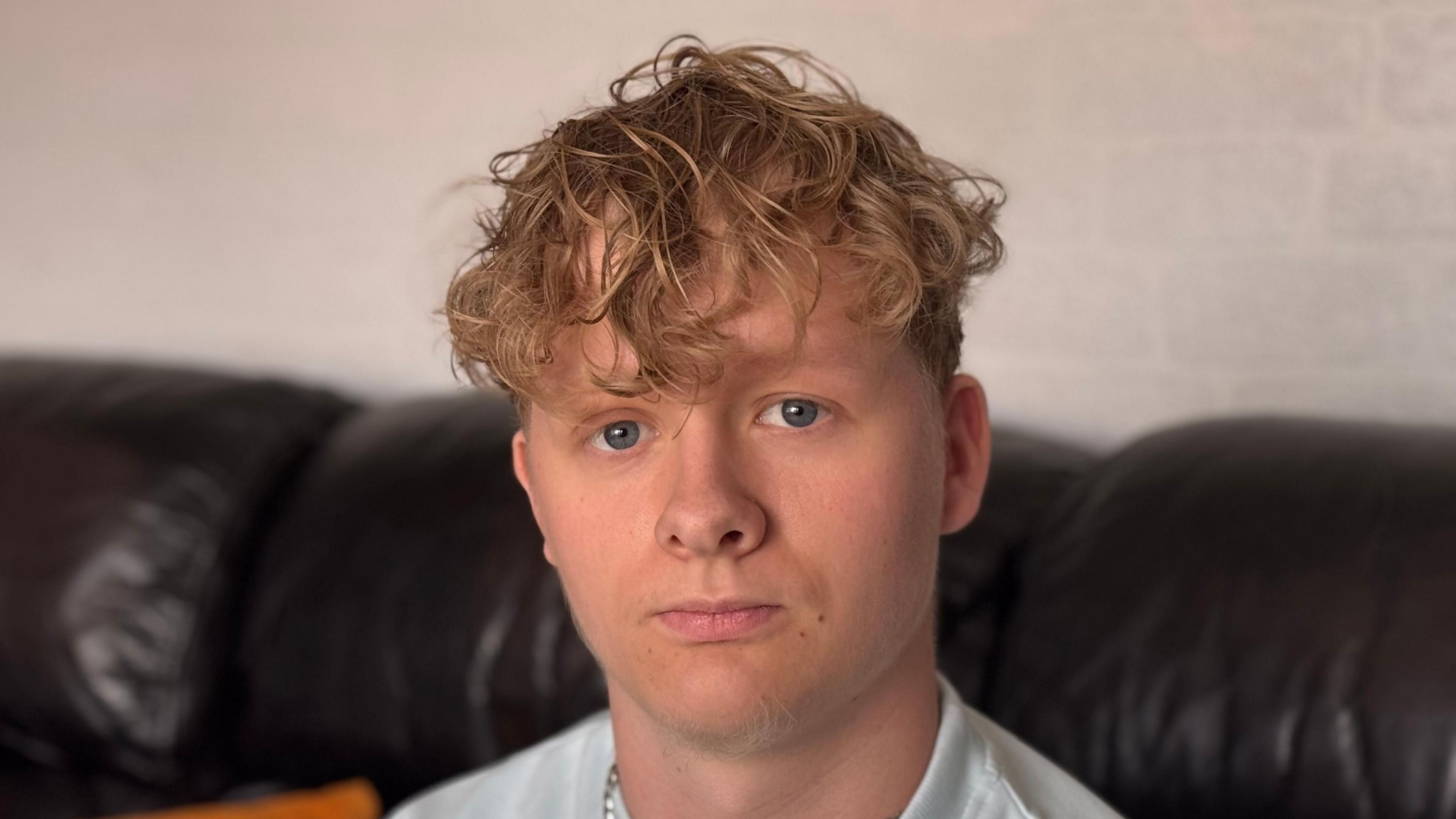 A close-up headshot of Harry Pyett. He is looking straight into the camera.