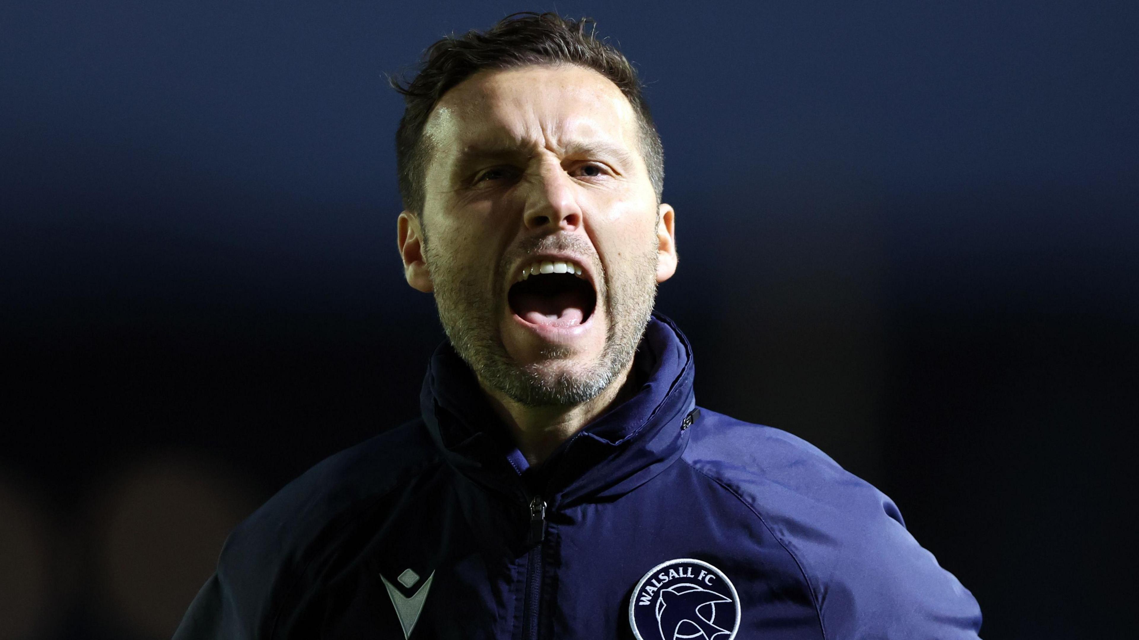 Mat Sadler shouts in celebration 