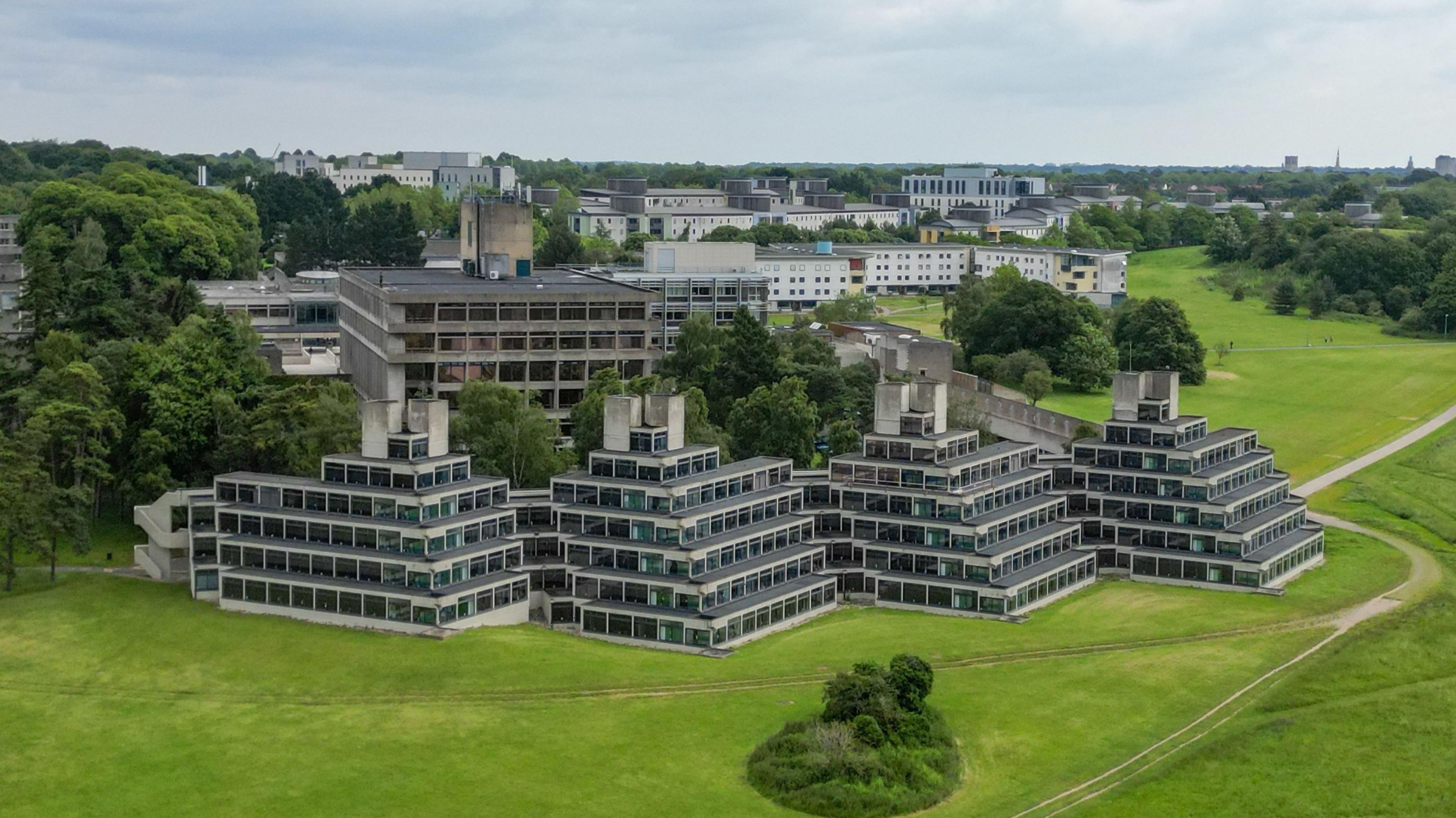 Aerial of the University of East Anglia, showing its ziggurat student housing blocks in the forefront 