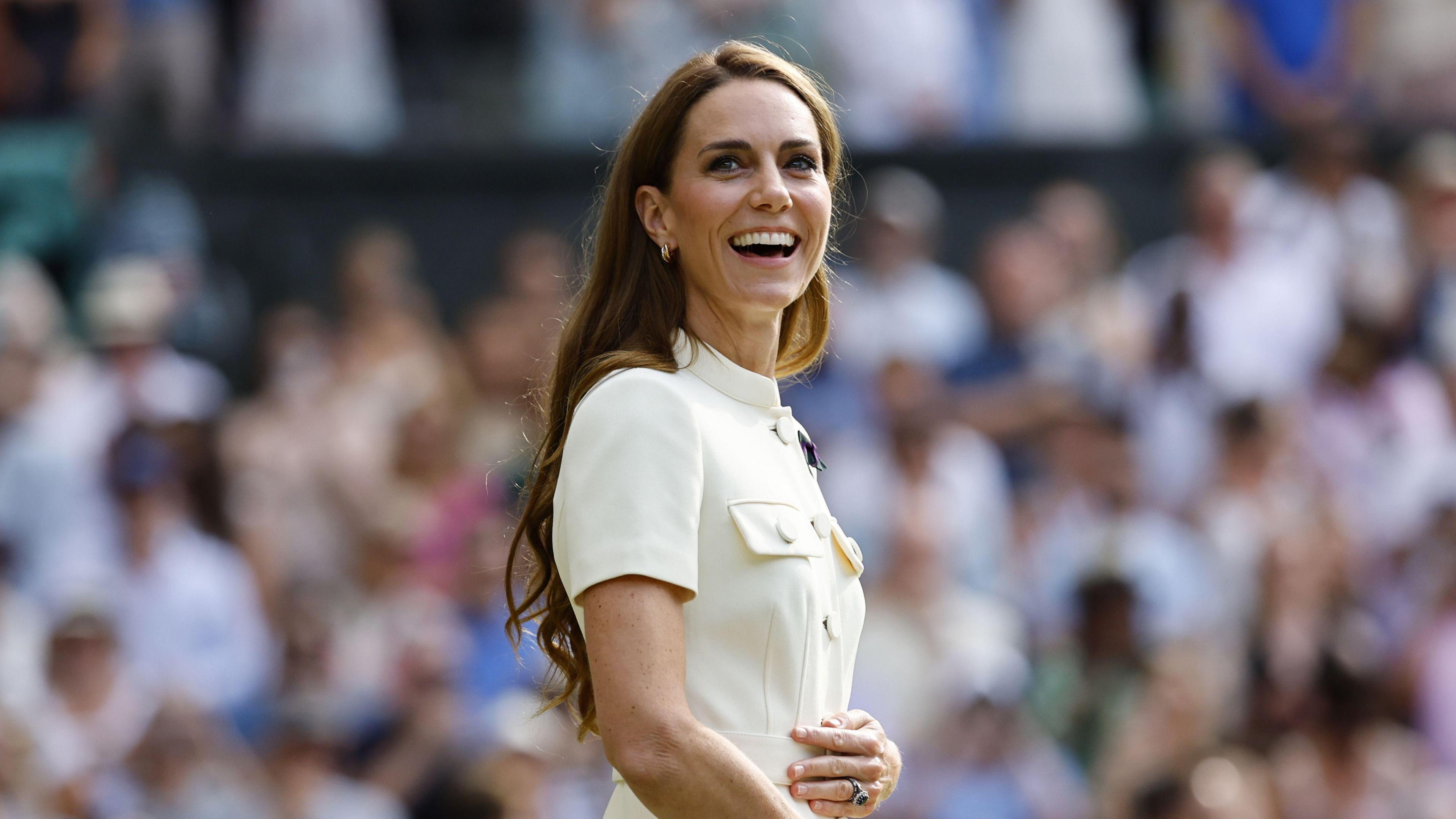 Catherine, Princess of Wales, wears white on a sunny day at Wimbledon