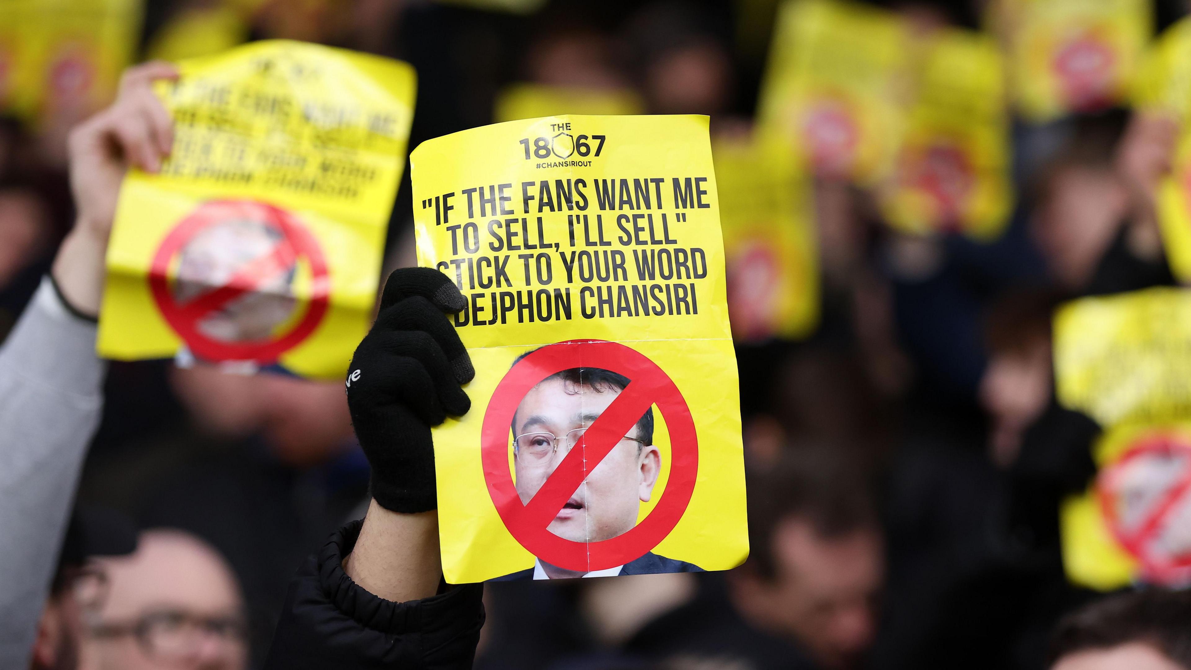 A photo of a Sheffield Wednesday protest sign that states: "If the fans want me to sell, I'll sell - stick to your word Dejphon Chansiri."