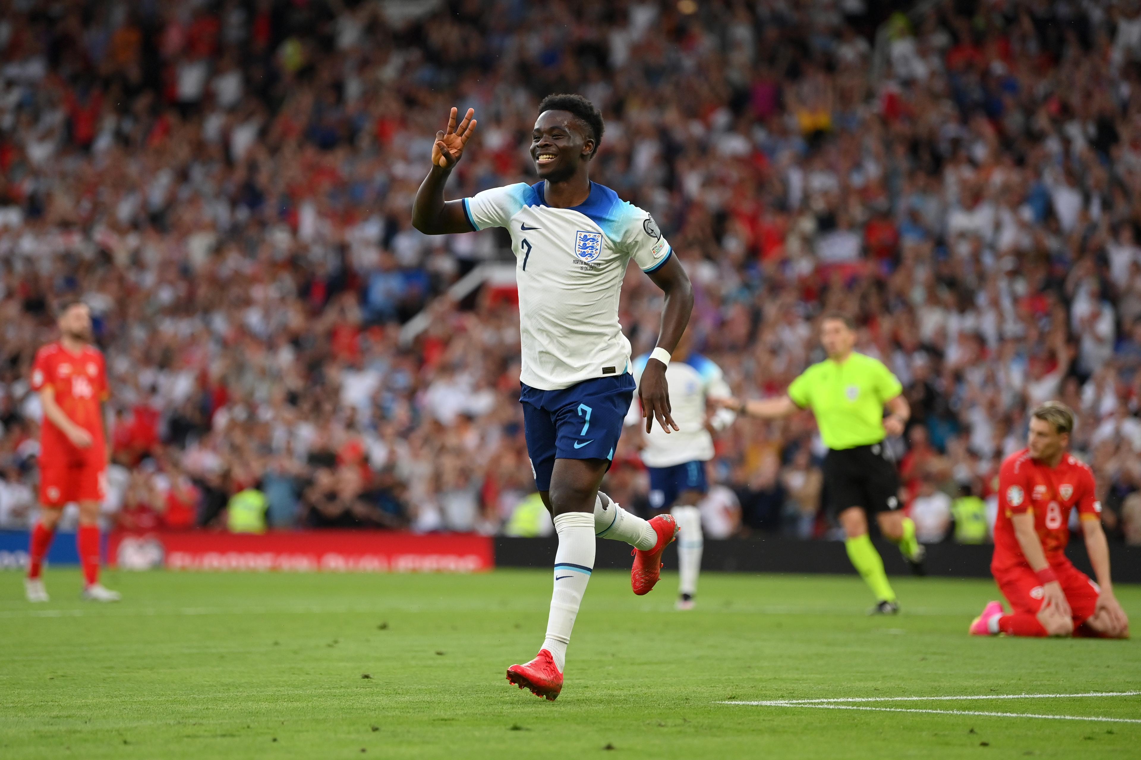 England's Bukayo Saka celebrates scoring their side's fifth goal of the game of the game, completing his hat-trick during the UEFA Euro 2024 Qualifying Group C match at Old Trafford