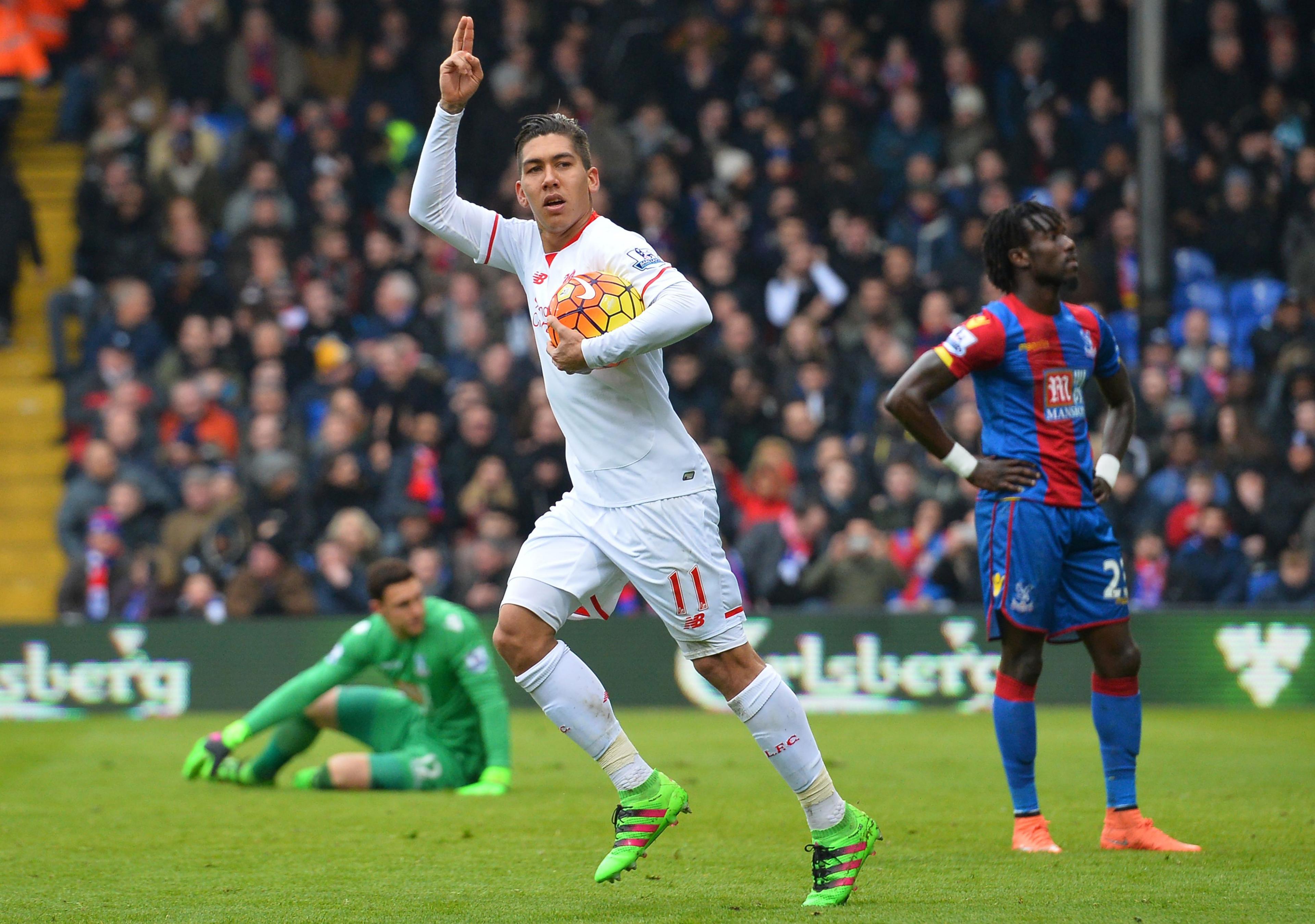 Roberto Firmino celebrates after scoring Liverpool's equaliser