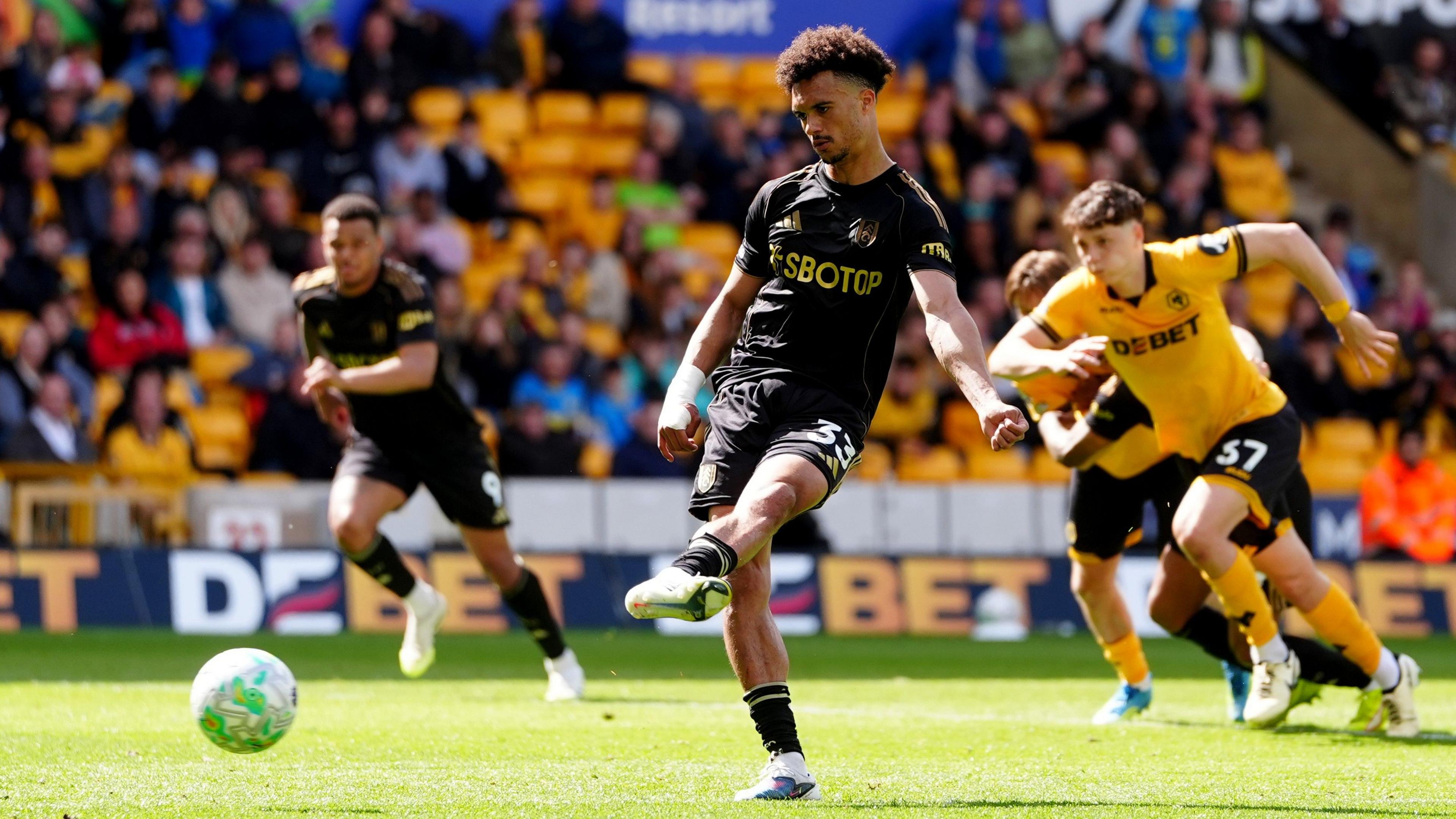 Fulham's Antonee Robinson scores penalty at Wolves