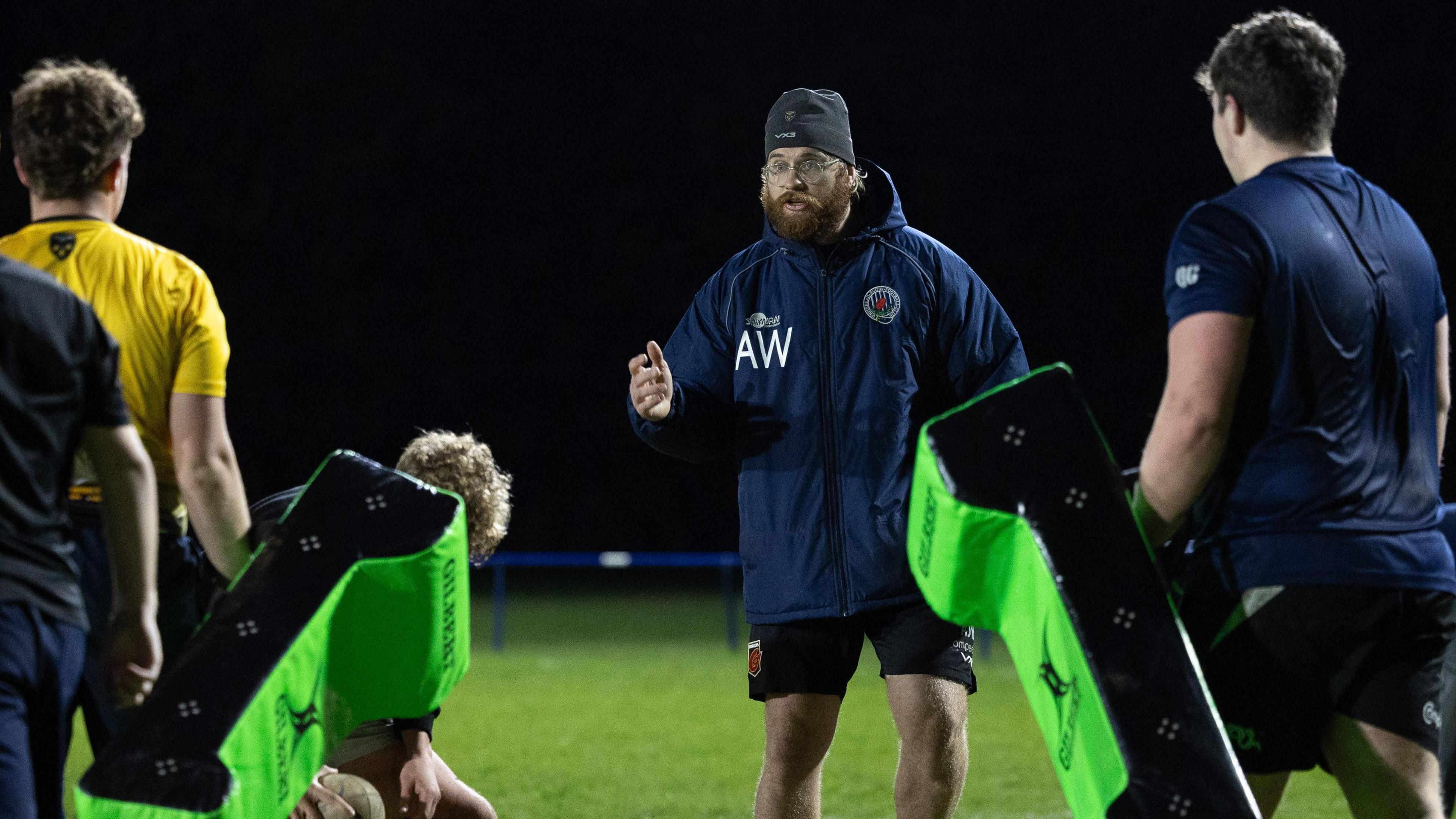 Aaron Wainwright, who has done his level two coaching badges with the Welsh Rugby Union, guiding Whitehead players in a training session