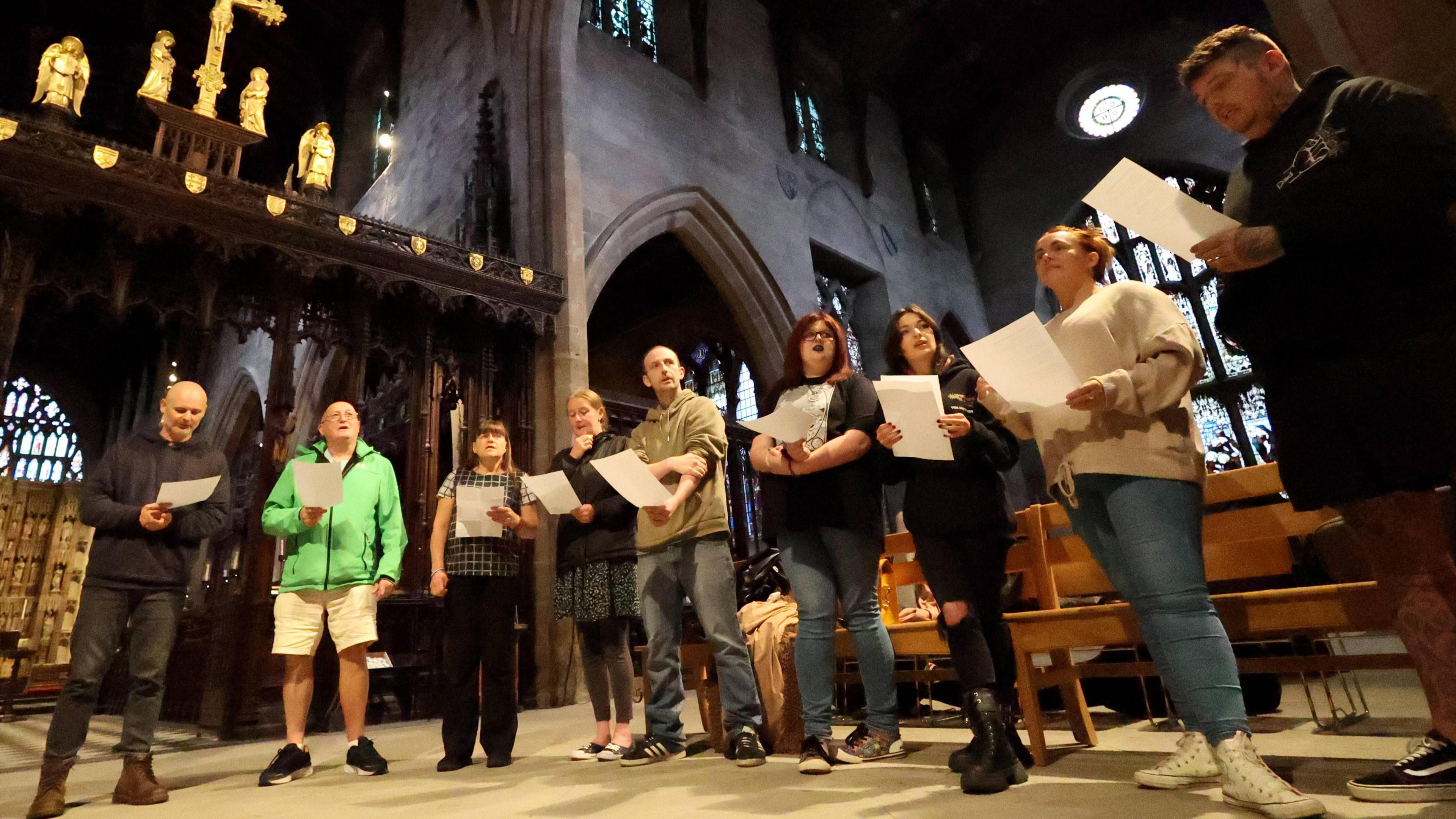 A group singing together in Newcastle cathedral 