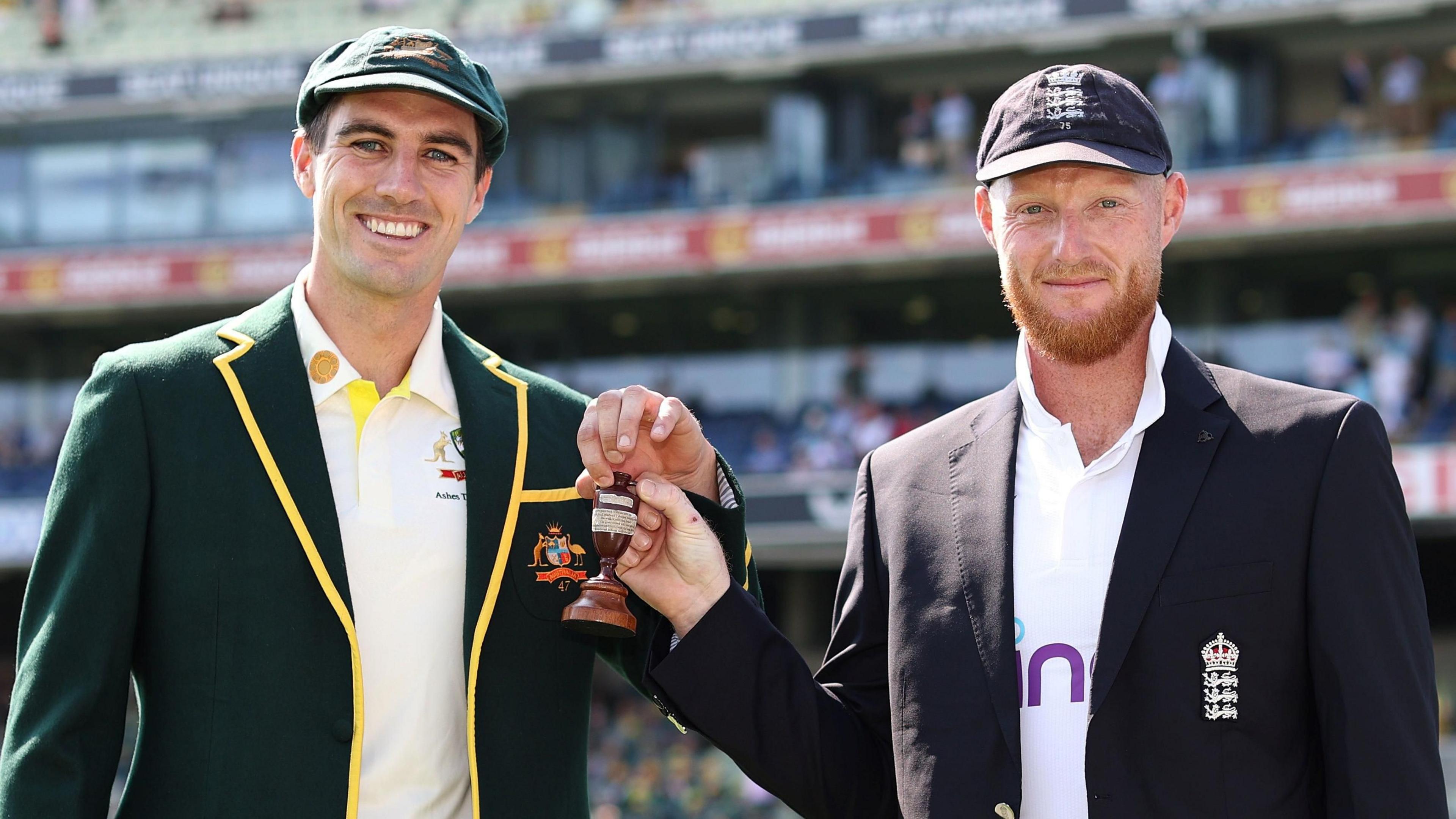 Australia captain Pat Cummins and England skipper Ben Stokes pose with the Ashes urn