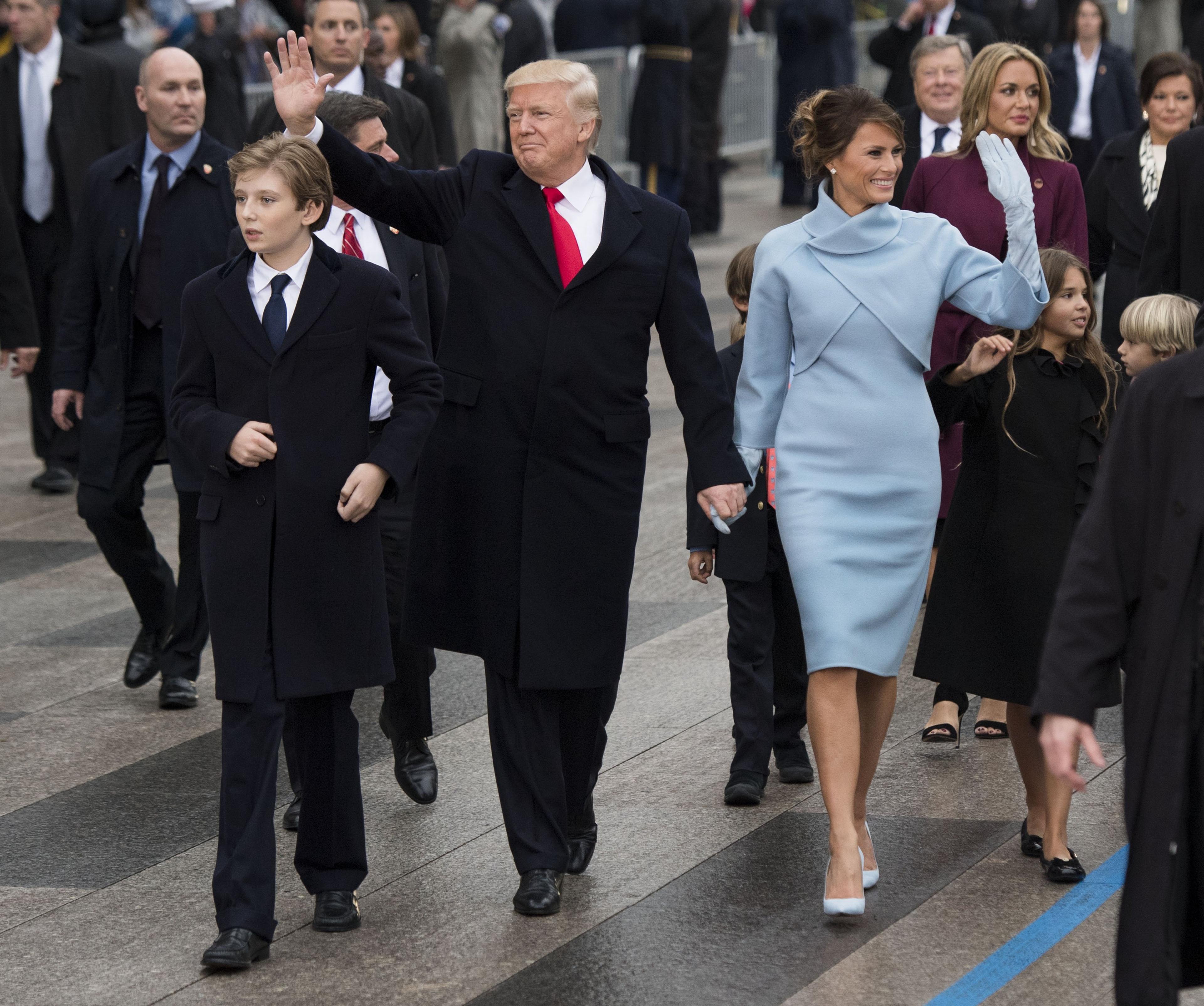 US President Donald Trump with his wife Melania and son Barron