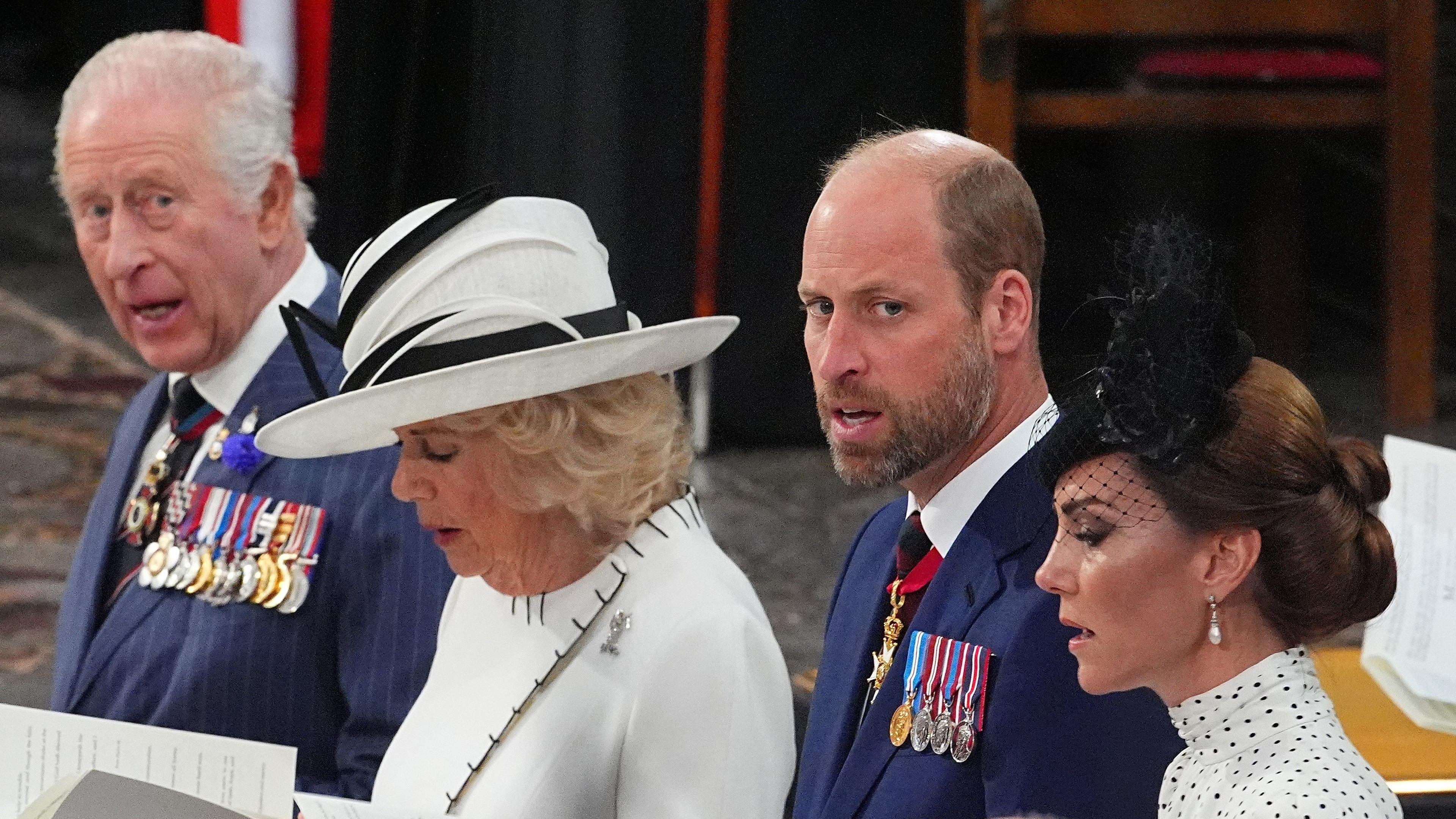 The King, Queen, Prince of Wales and Princess of Wales at Westminster Abbey during the Thanksgiving service. They are all singing.
