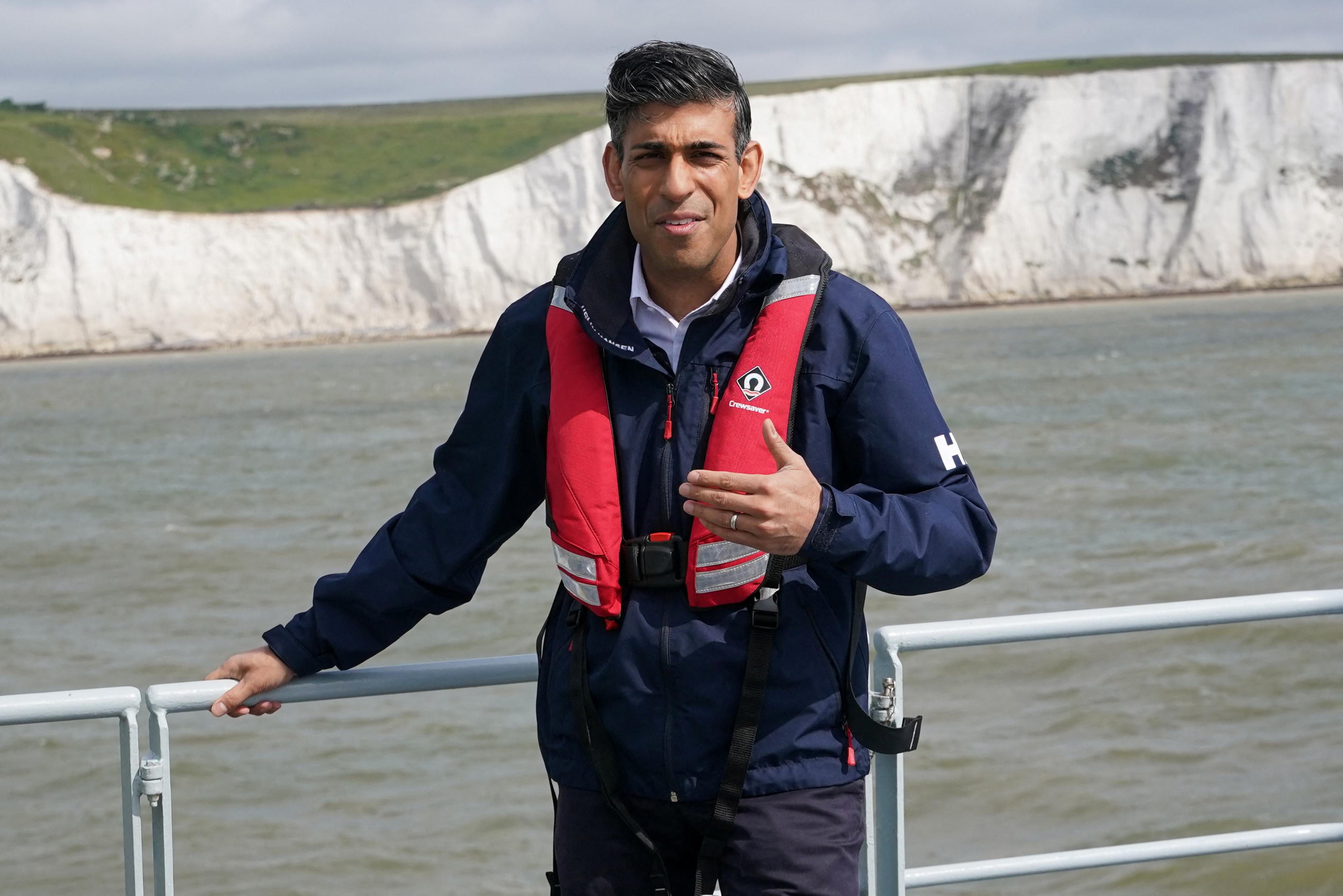 A picture of Rishi Sunak on a boat during a visit to Dover