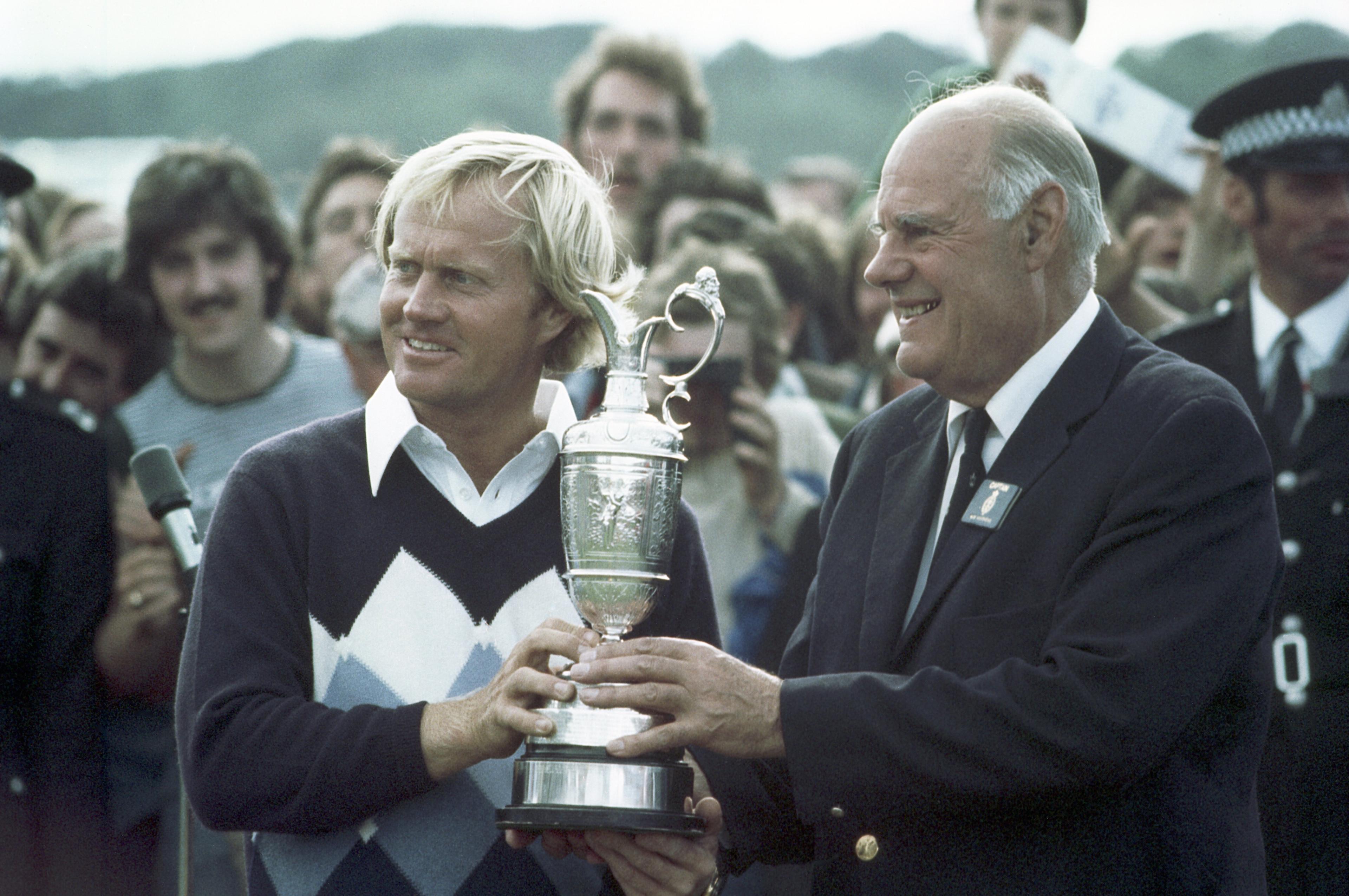 Jack Nicklaus holding the Open trophy after winning the claret jug