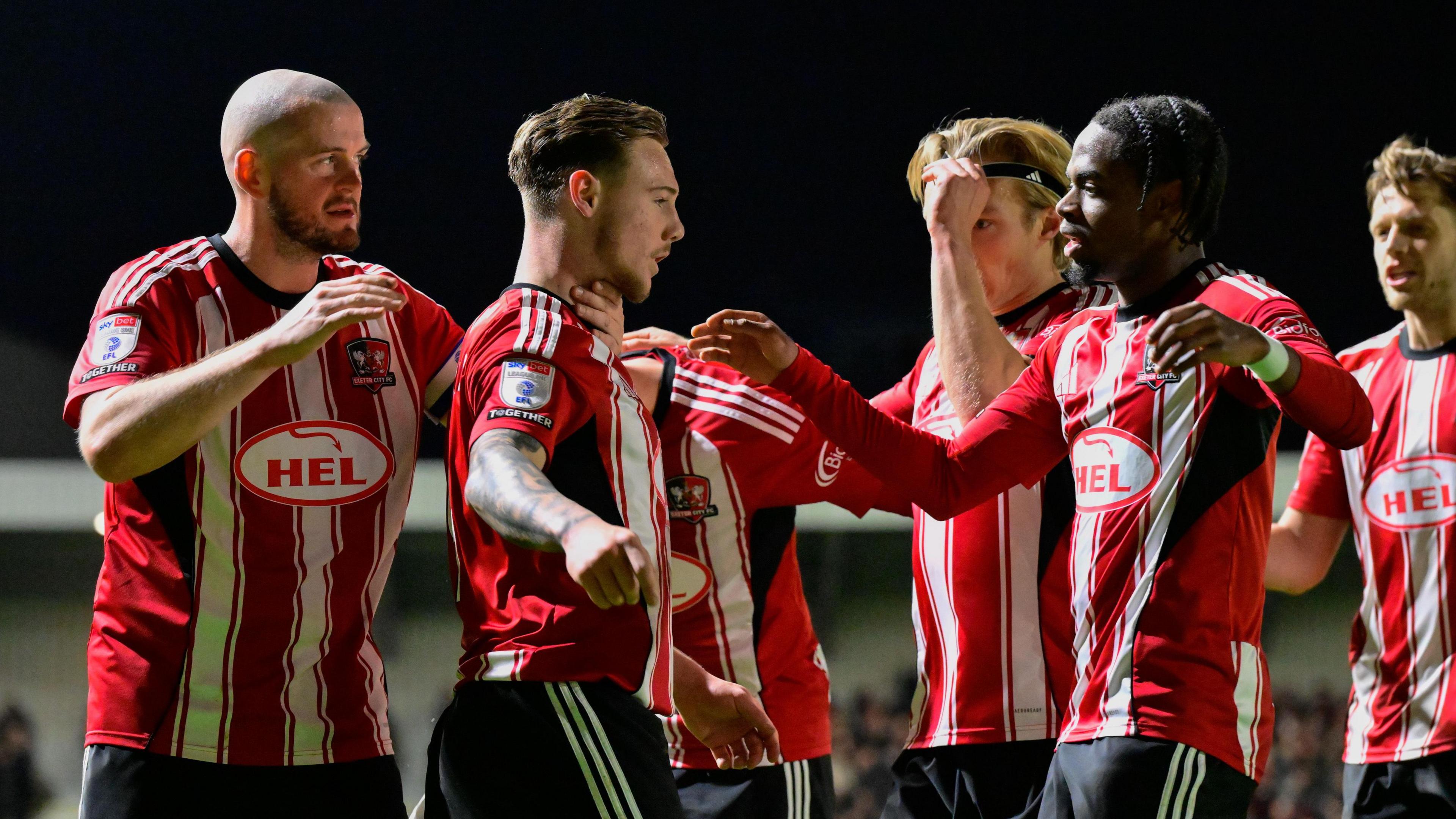 Goal celebrations for Jayden Wareham of Exeter City after scoring the opening goal