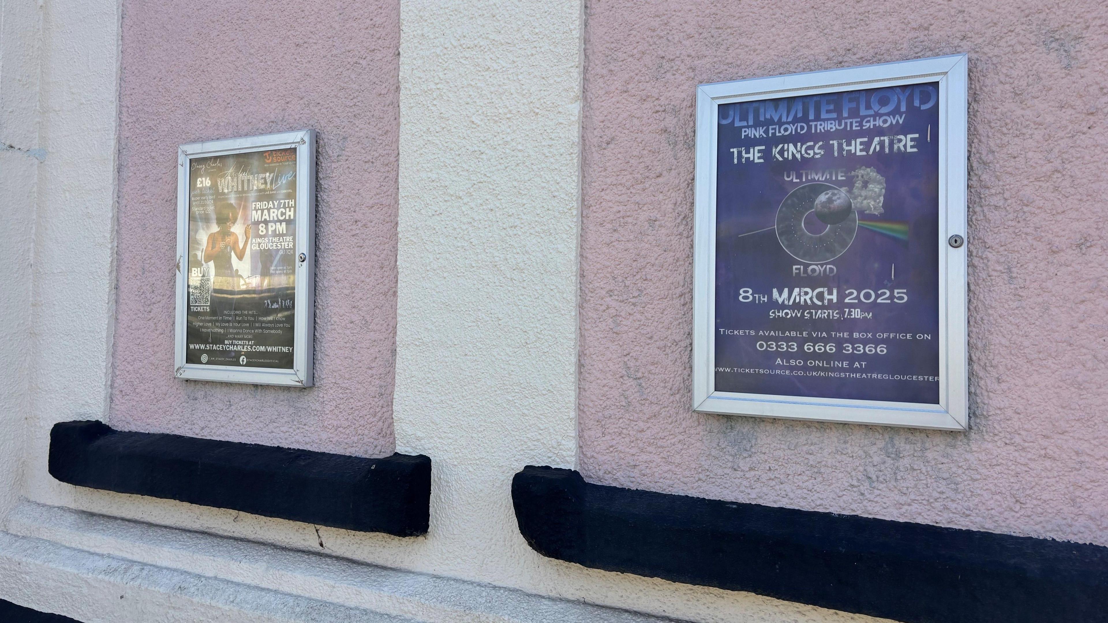 Two posters on the side of King's Theatre in Gloucester. One is for a Whitney Houston tribute event, and the other one is an Pink Floyd tribute event.