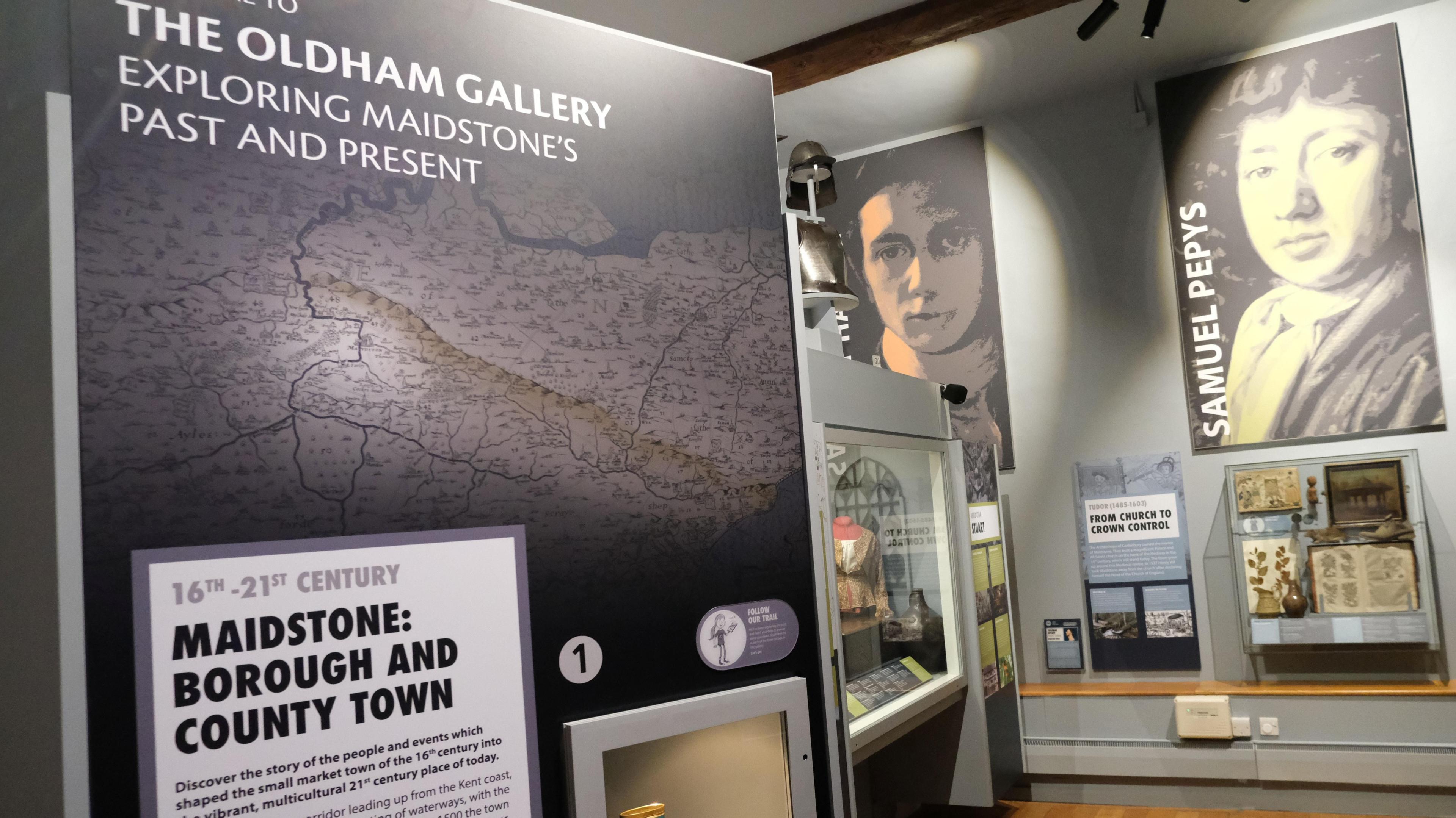 A scene from inside the Oldham Gallery showing signage about Maidstone's past and present
