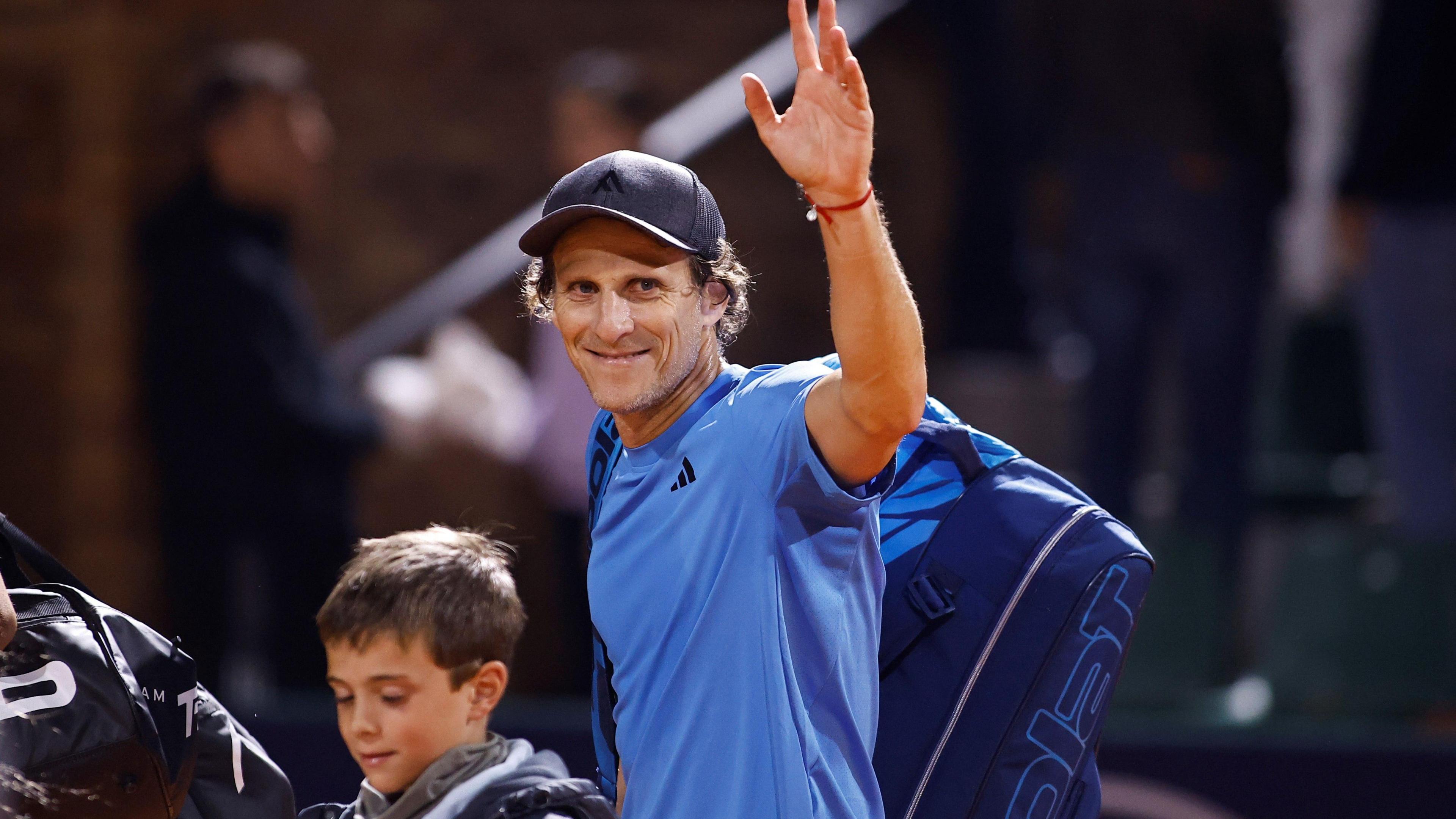 Diego Forlan waves towards the crowd