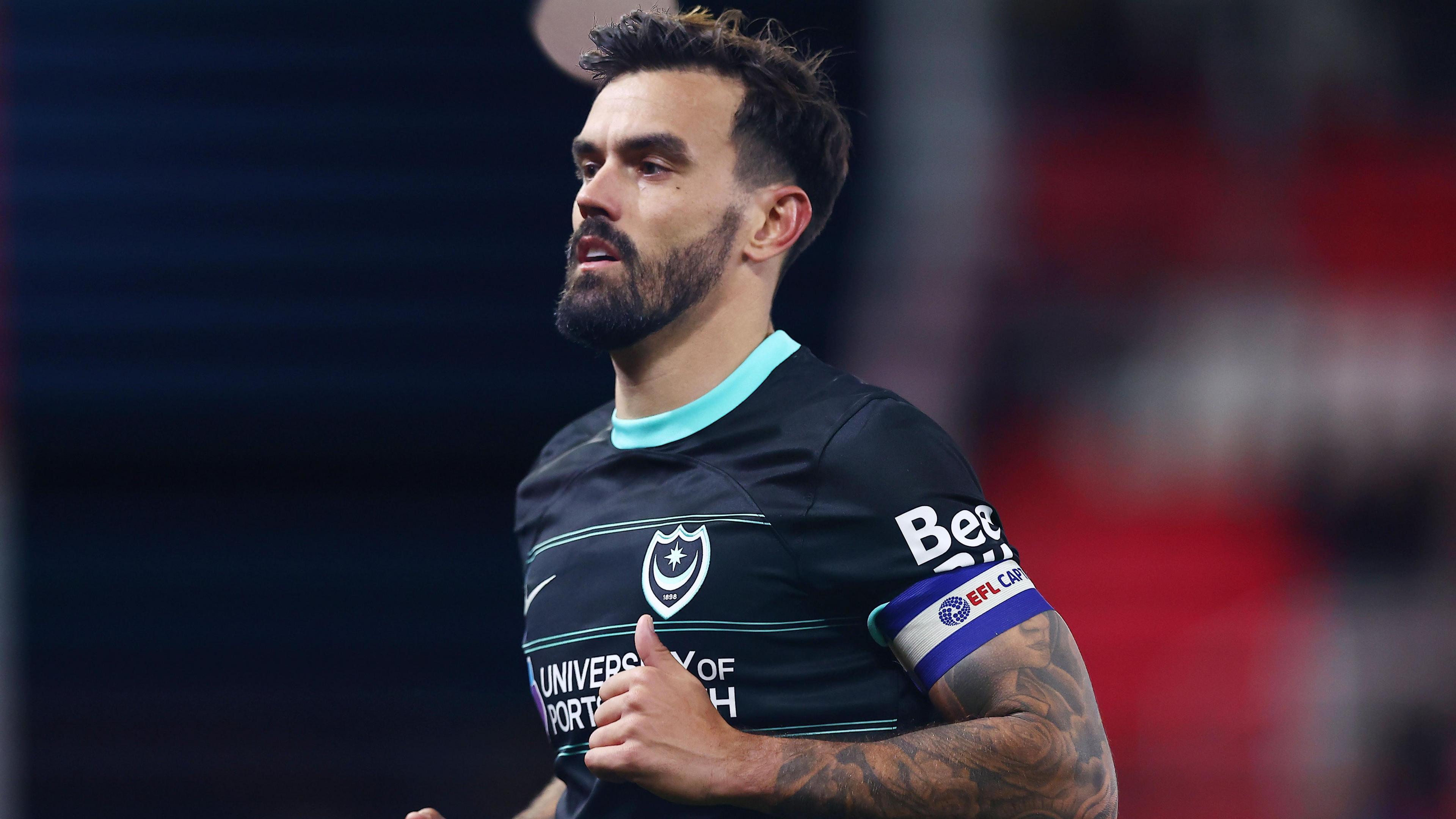 Marlon Pack of Portsmouth in action away at Stoke City