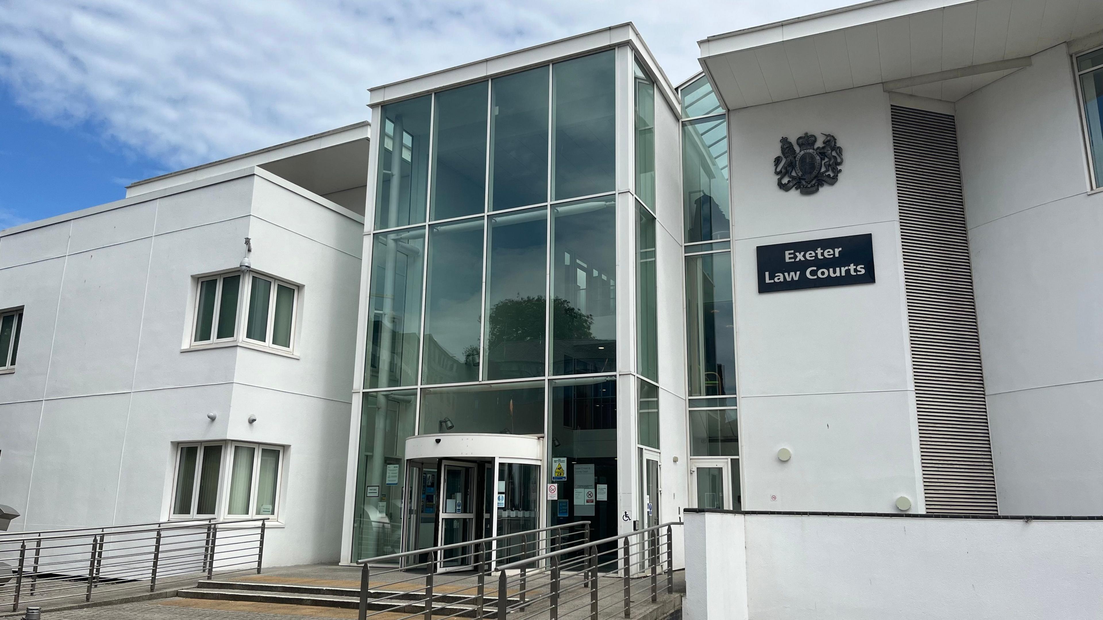 Exeter Law Courts - a white court building with a large glass entrance.