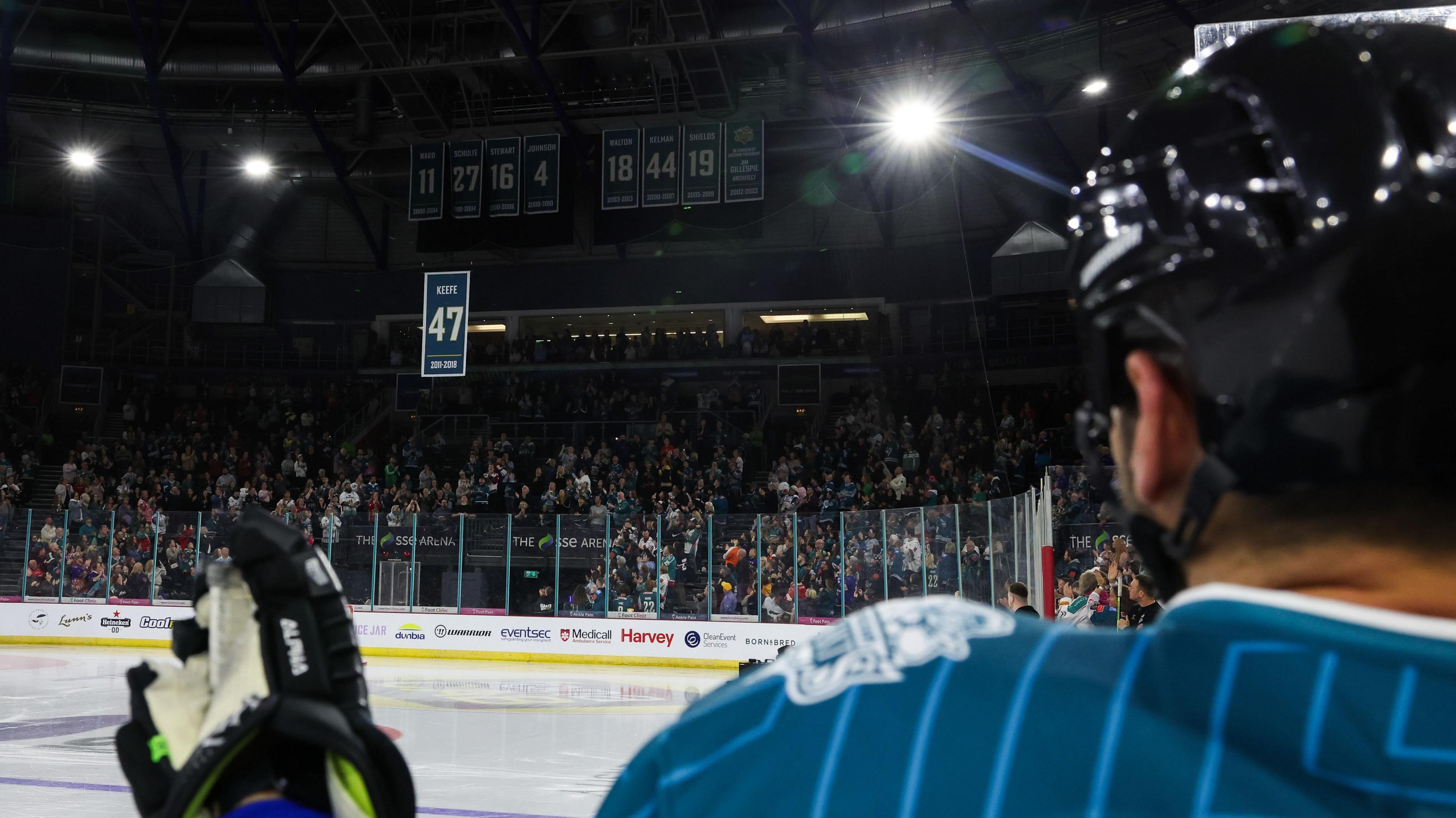 Adam Keefe watches as his jersey is retired by the Belfast Giants