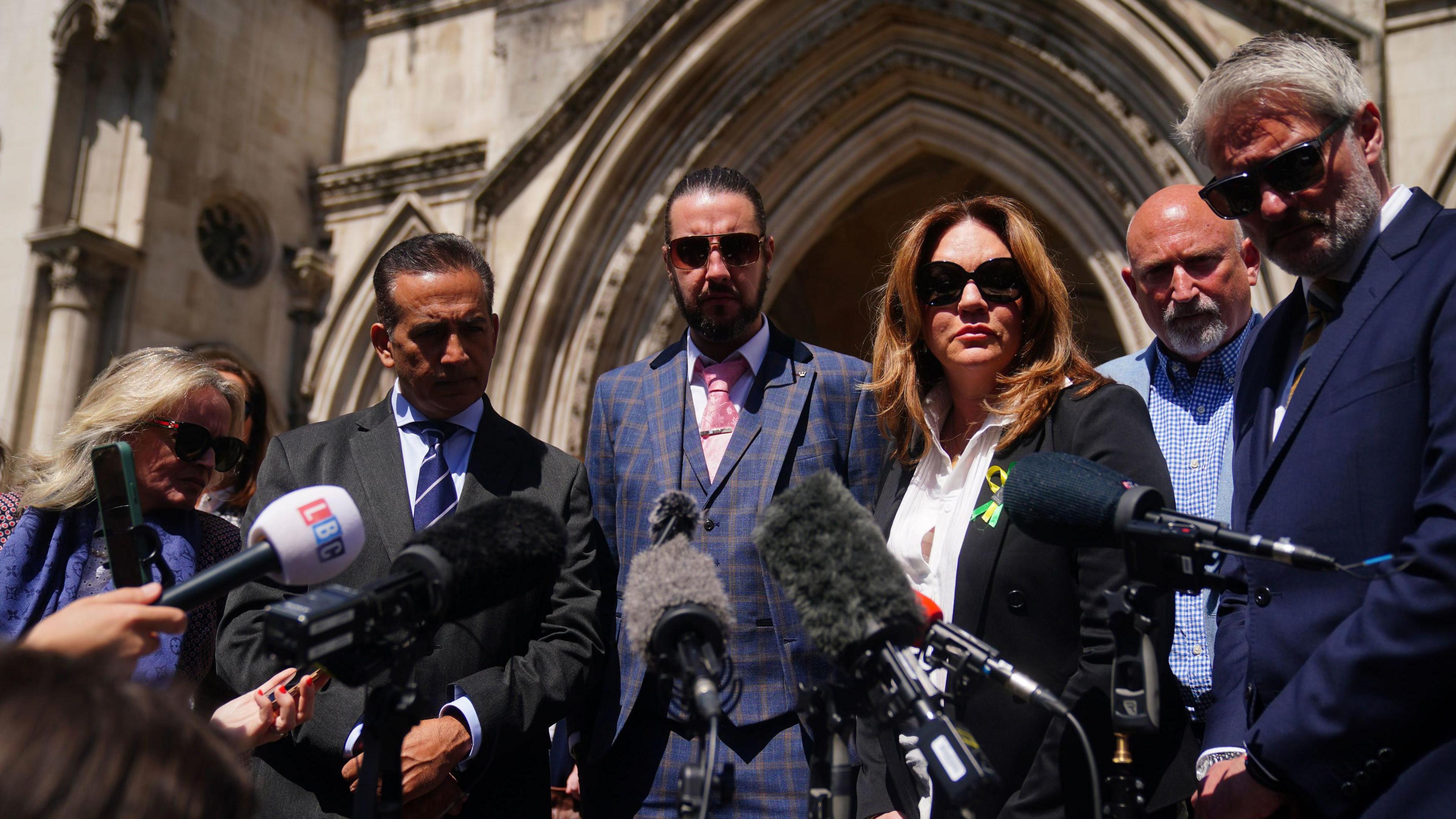 Calocane victims' families outside Royal Courts of Justice 