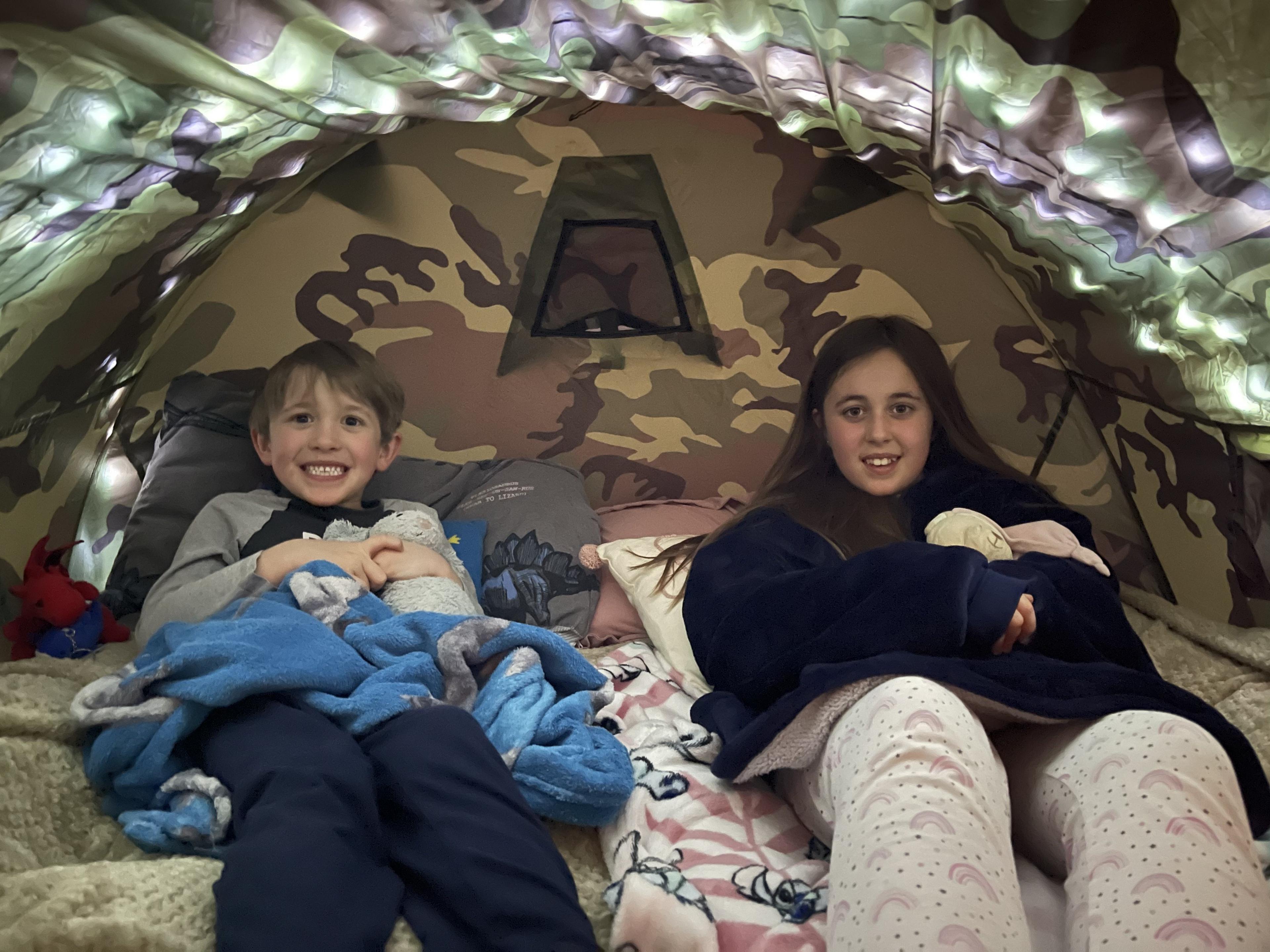 Lucy and Zachary Preston in tent