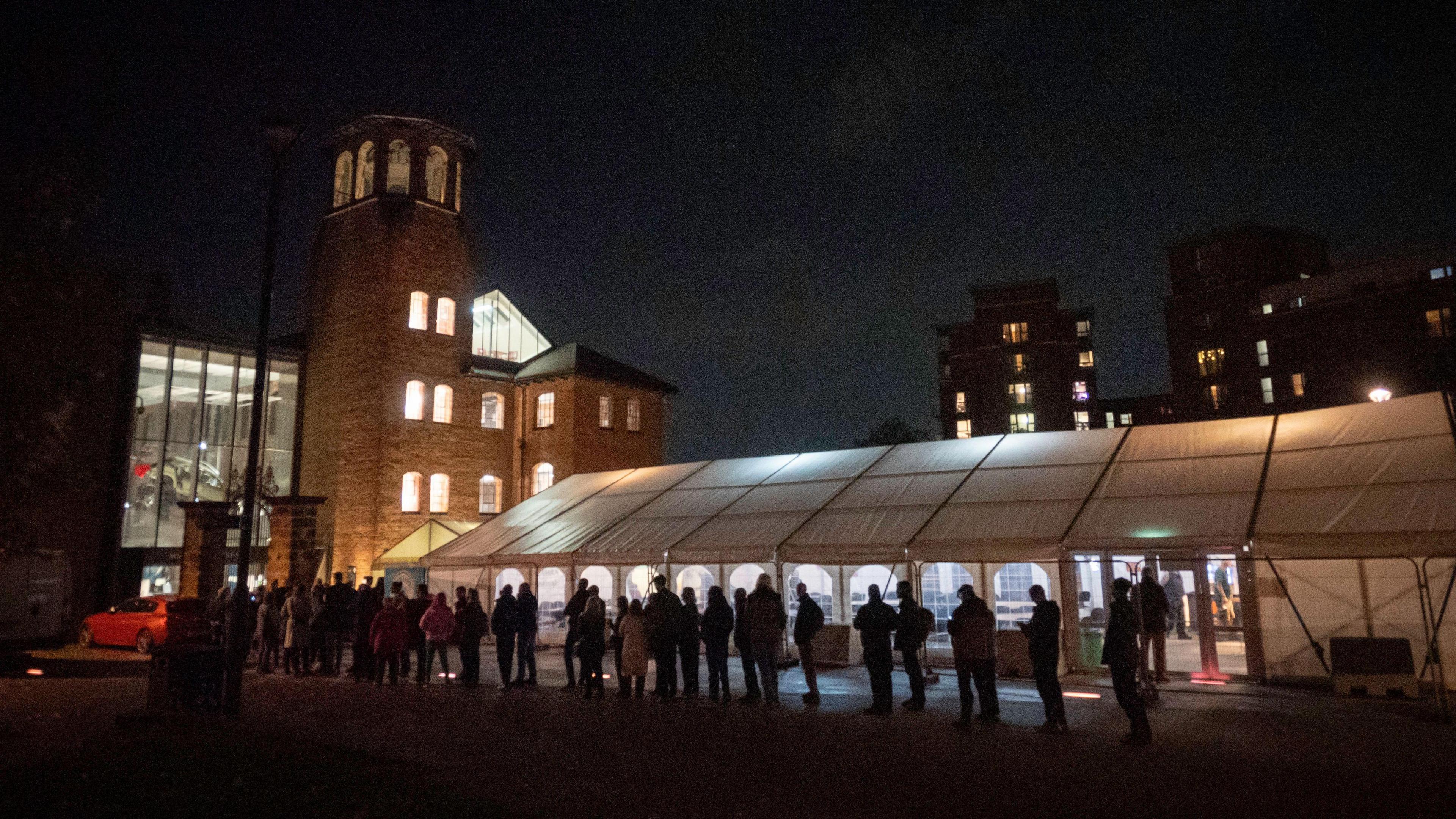 A queue of people waiting outside Derby's Museum of Making before the Derby Heritage Beer Festival