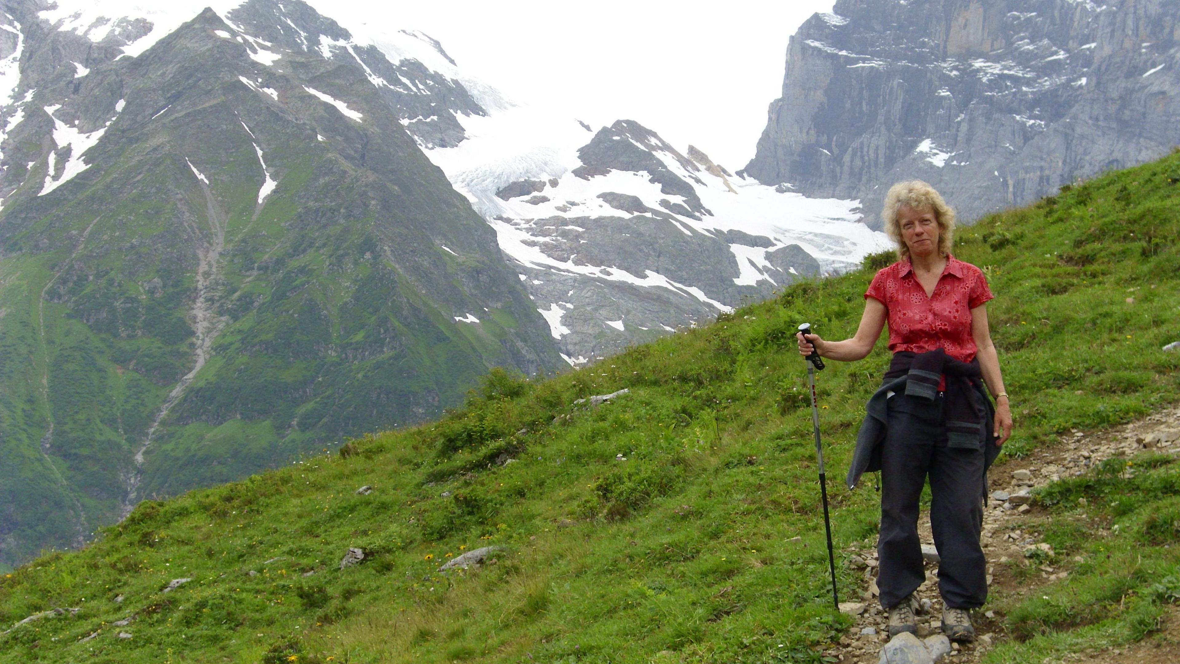 Alison walking in the mountains