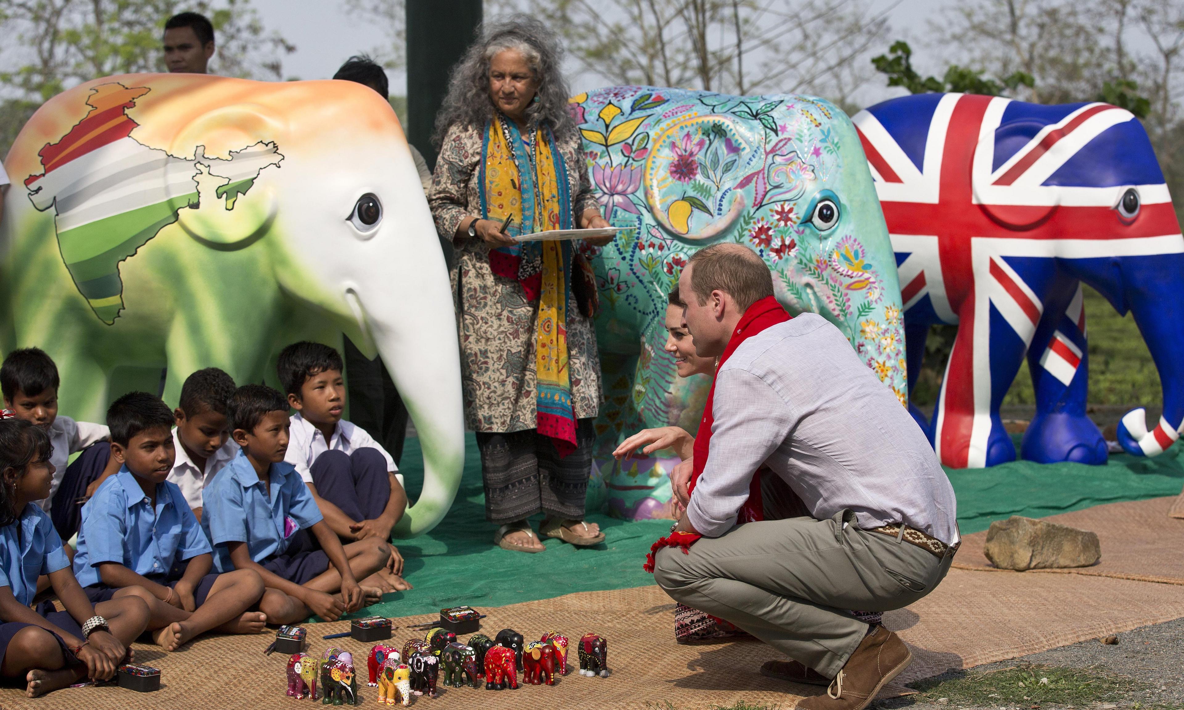 Prince William and wife The Duchess of Cambridge speak to kids from a local village in India