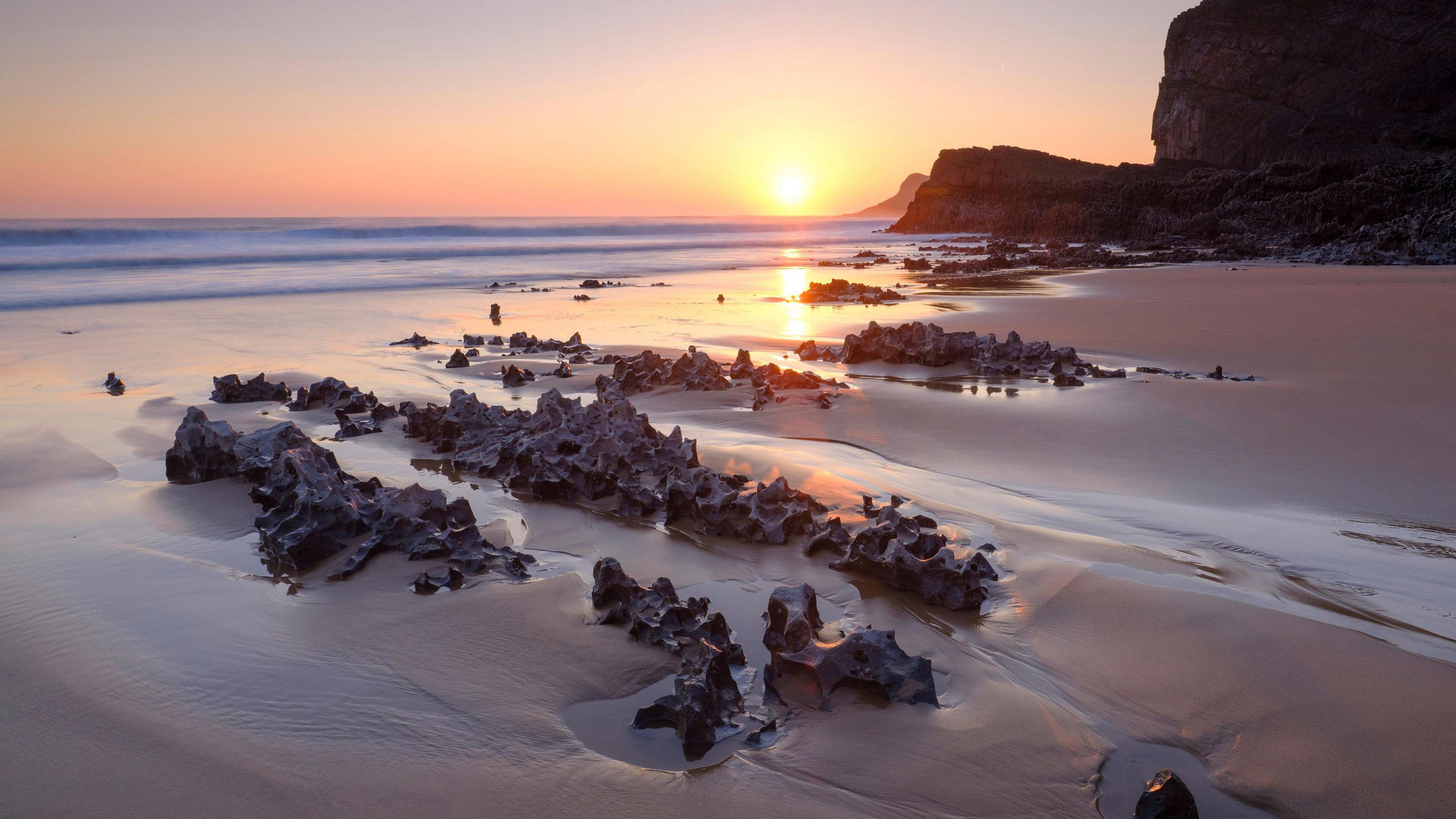 A view of the rocks at Mewslade Bay at Sunset