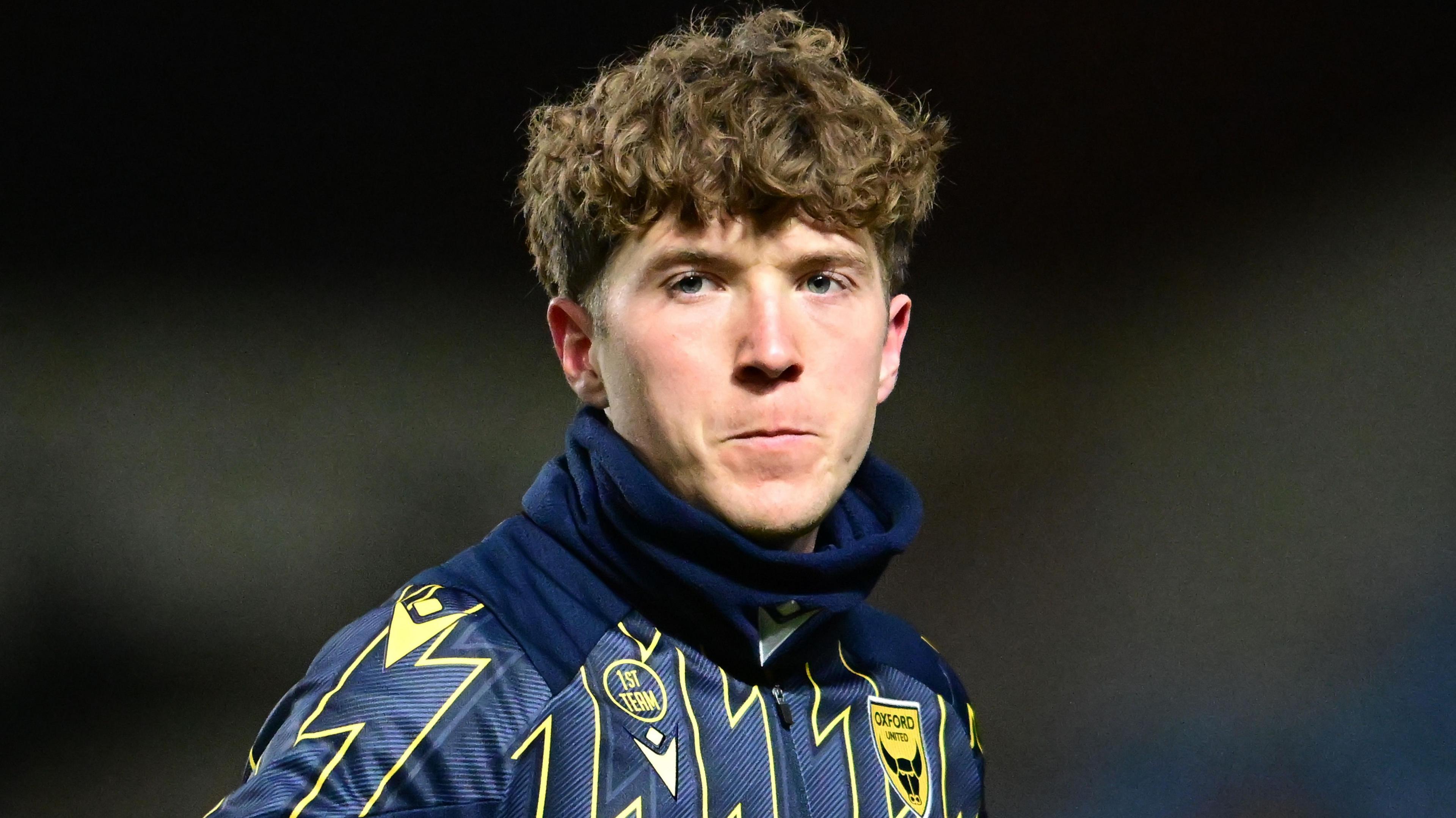 Close up of Oxford United forward Ole Romeny warming up