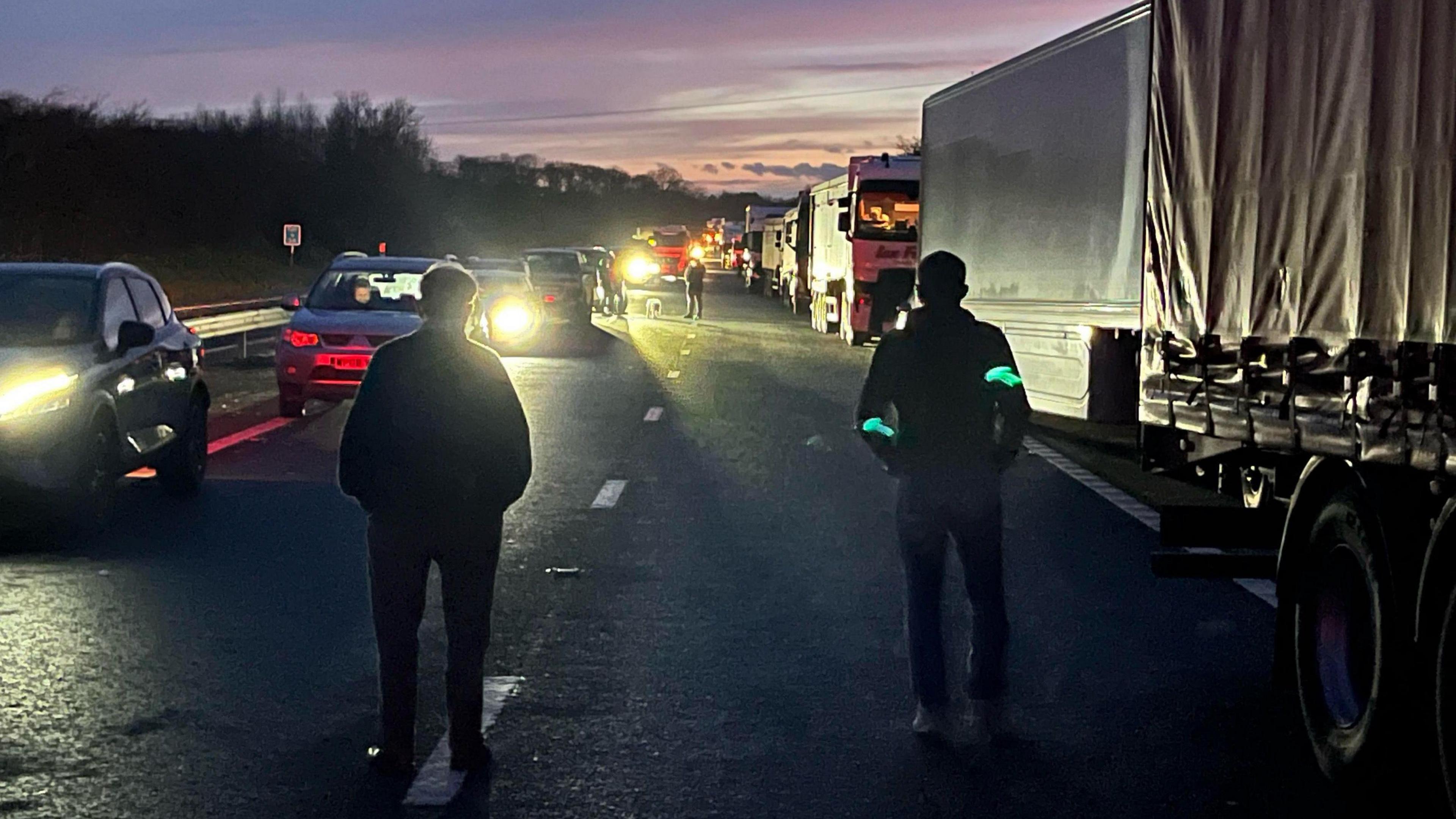 Motorway traffic on the M50 in the dark