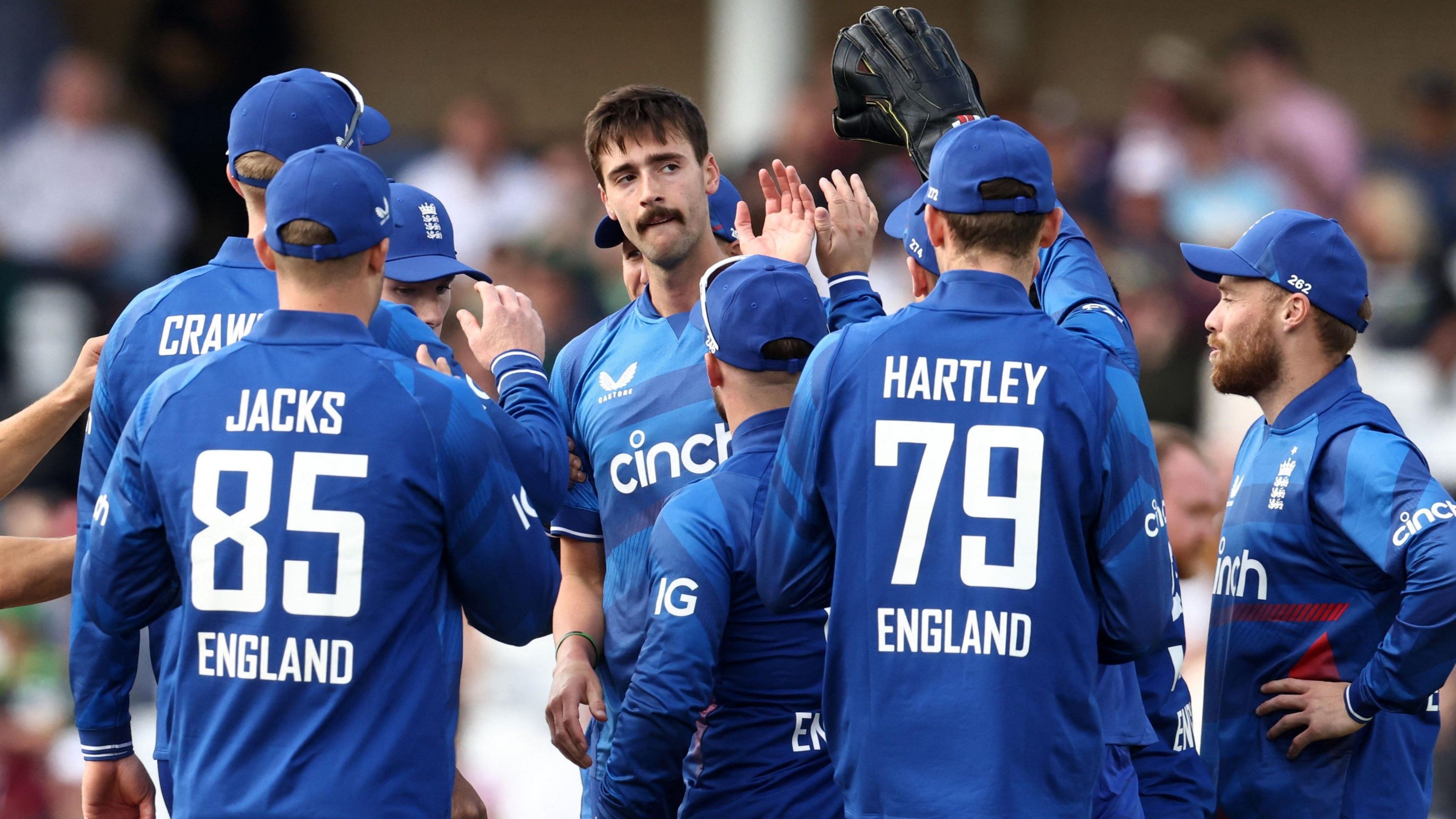 George Scrimshaw celebrates a wicket