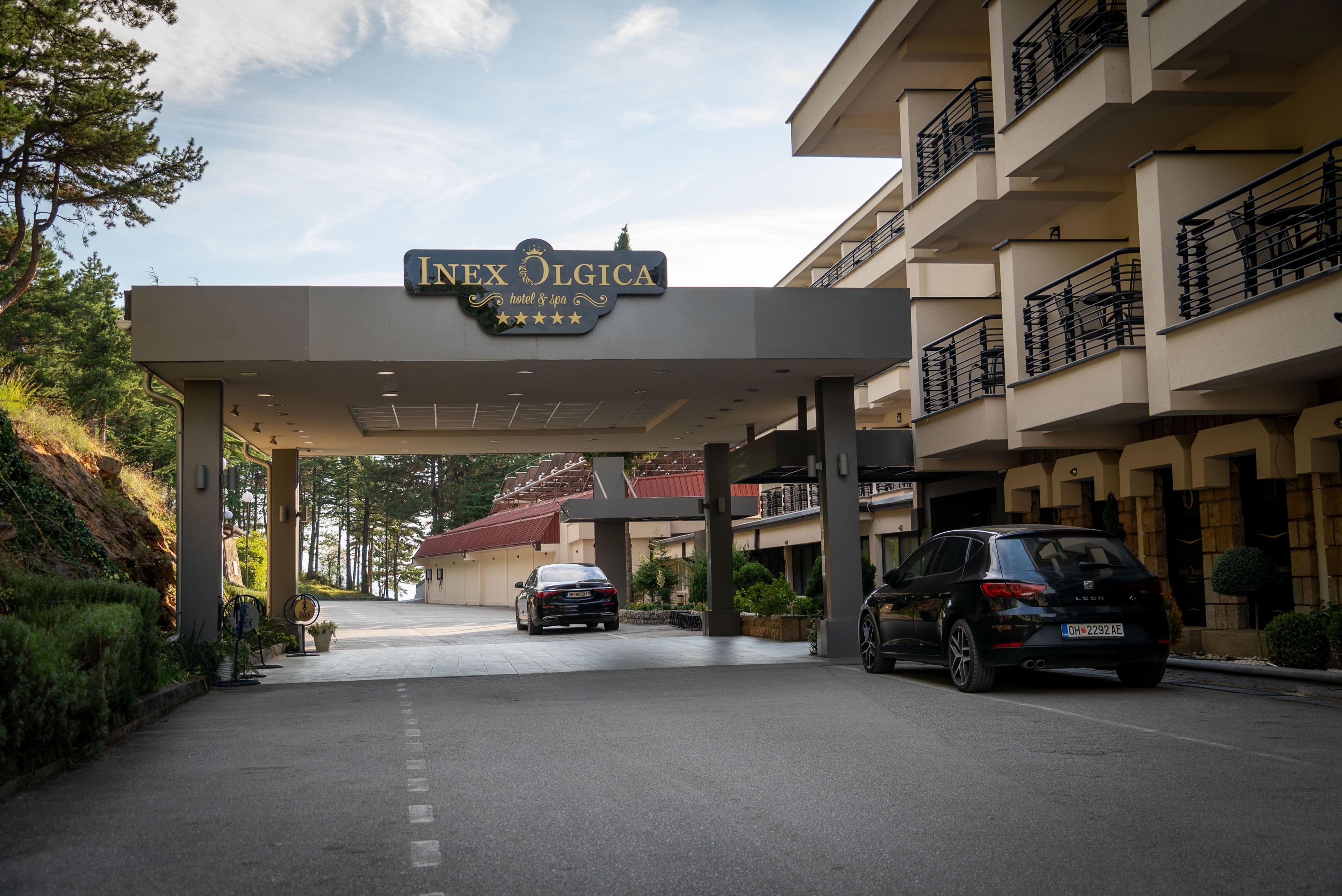 The entrance to the hotel in North Macedonia where Alex Salmond died, pictured from the road looking up at the building. 