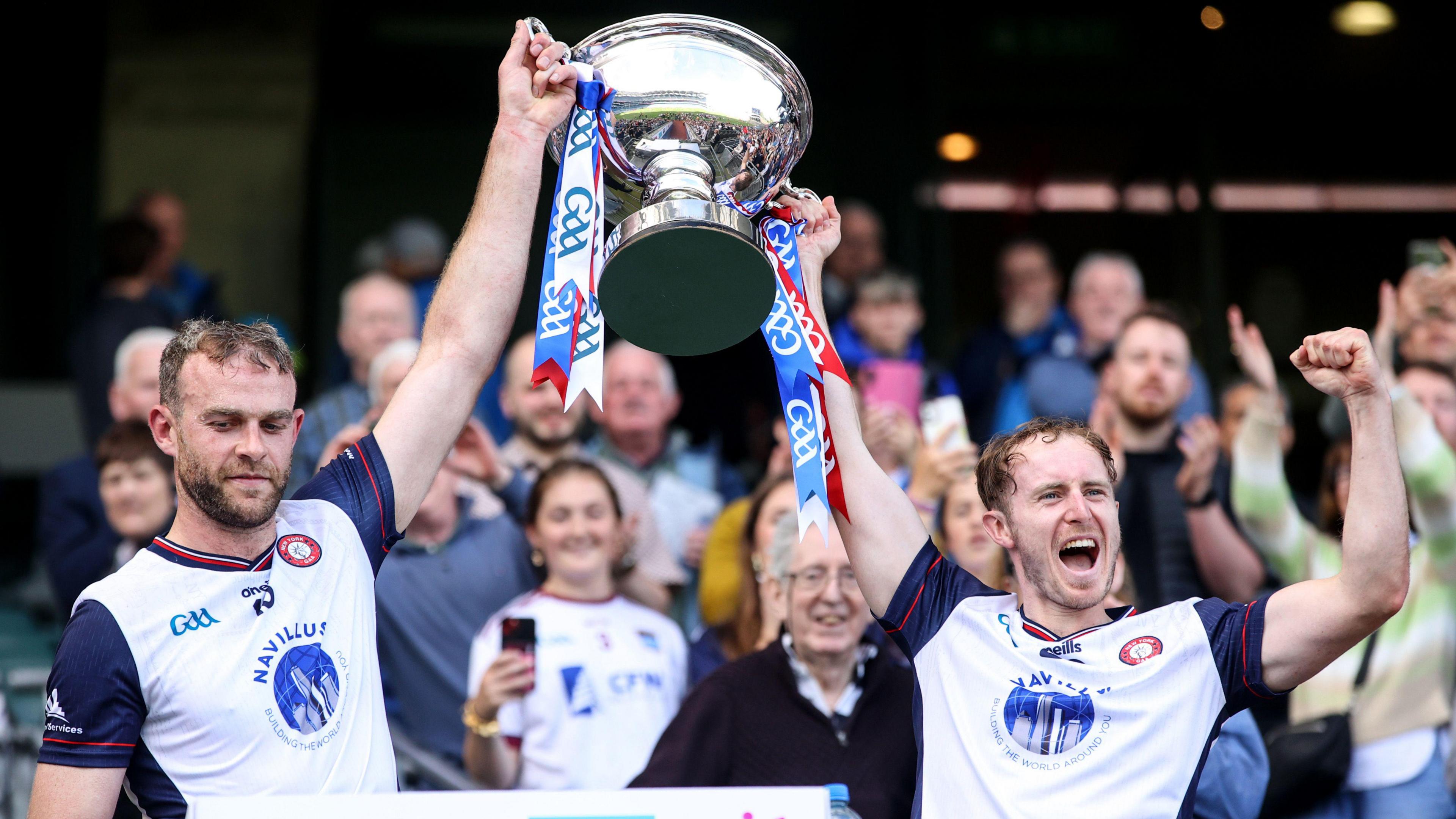Jonathan Glynn and James Breen lift the Lory Meagher Cup