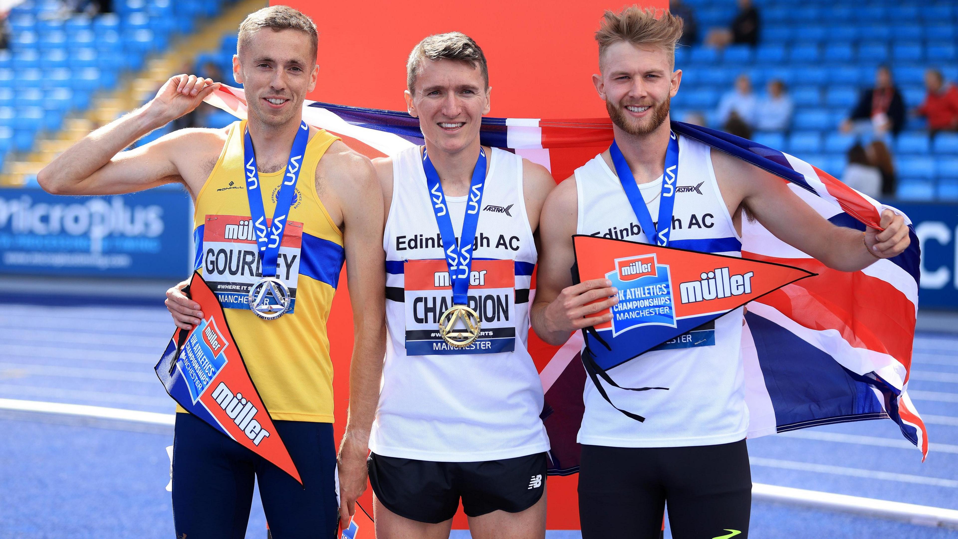 Neil Gourley, Jake Wightman and Josh Kerr pose with their medals