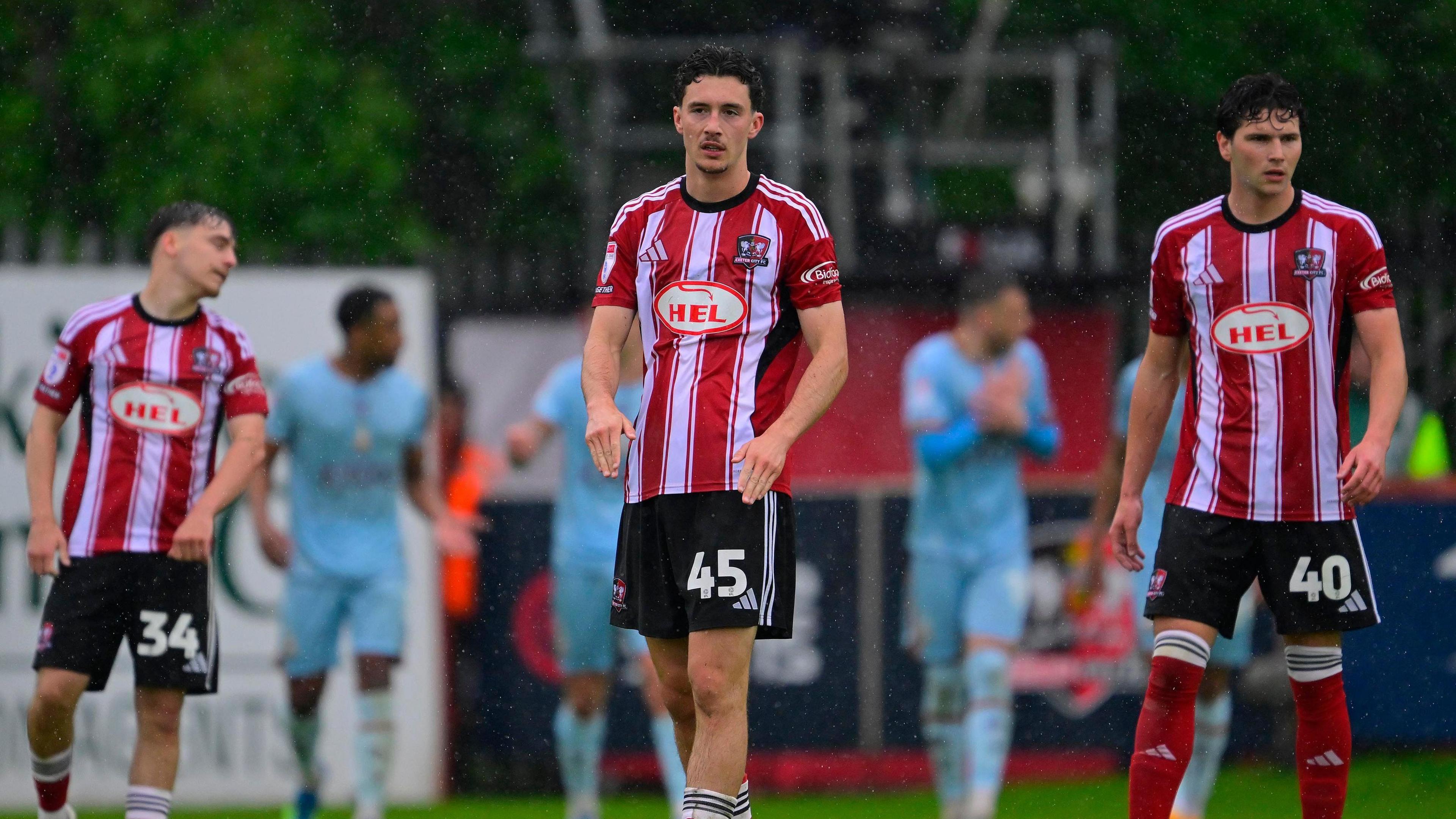Dejected Exeter players
