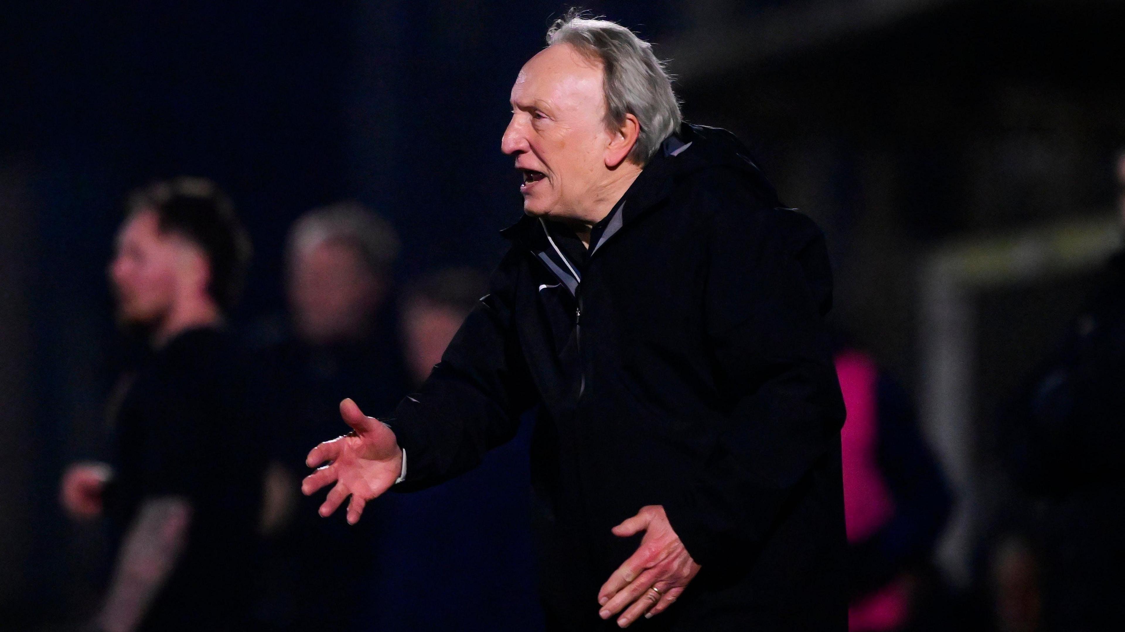 Neil Warnock delivers instructions to his team from the sidelines