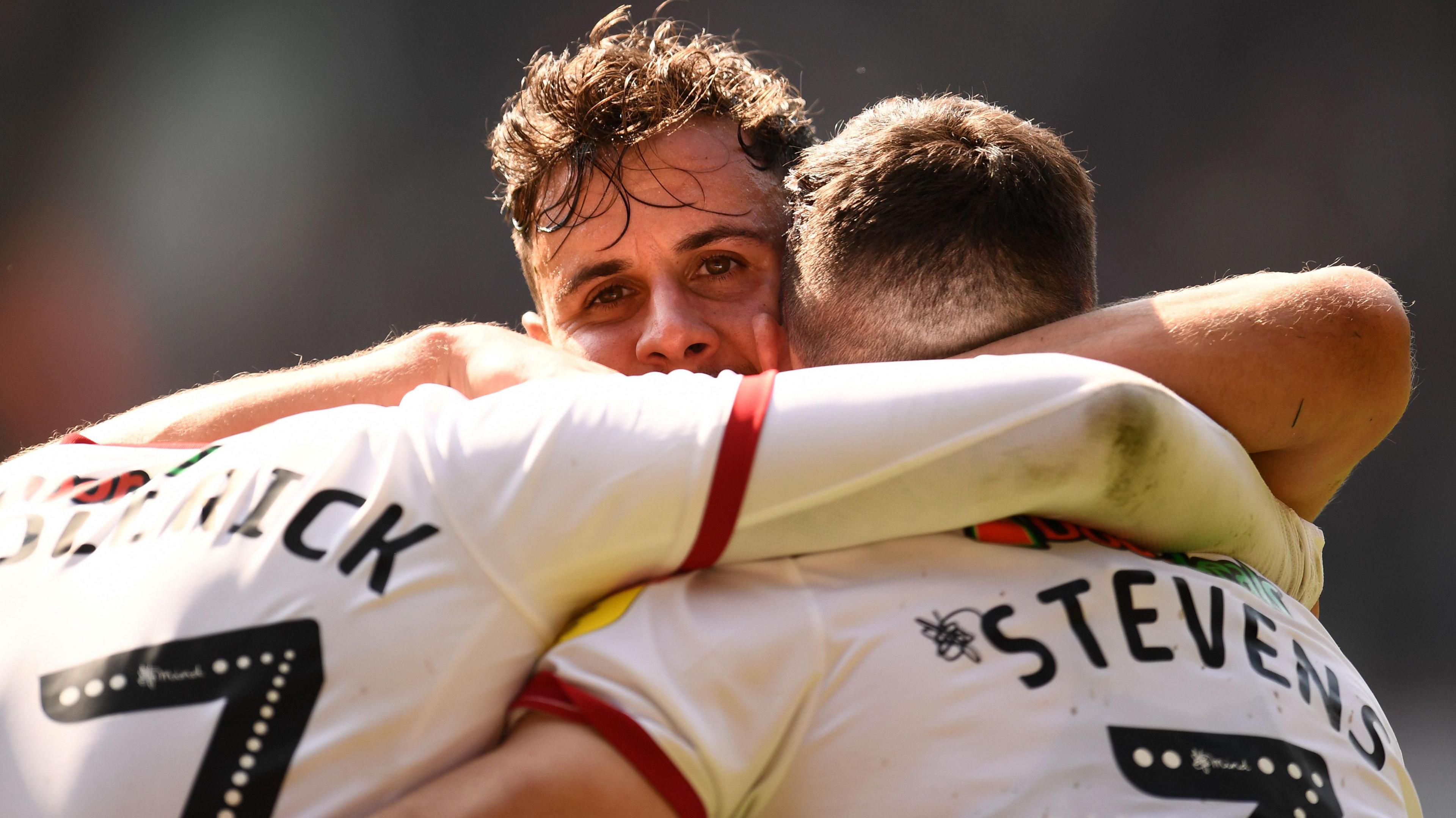 Enda Stevens and George Baldock celebrate a goal for Sheffield United